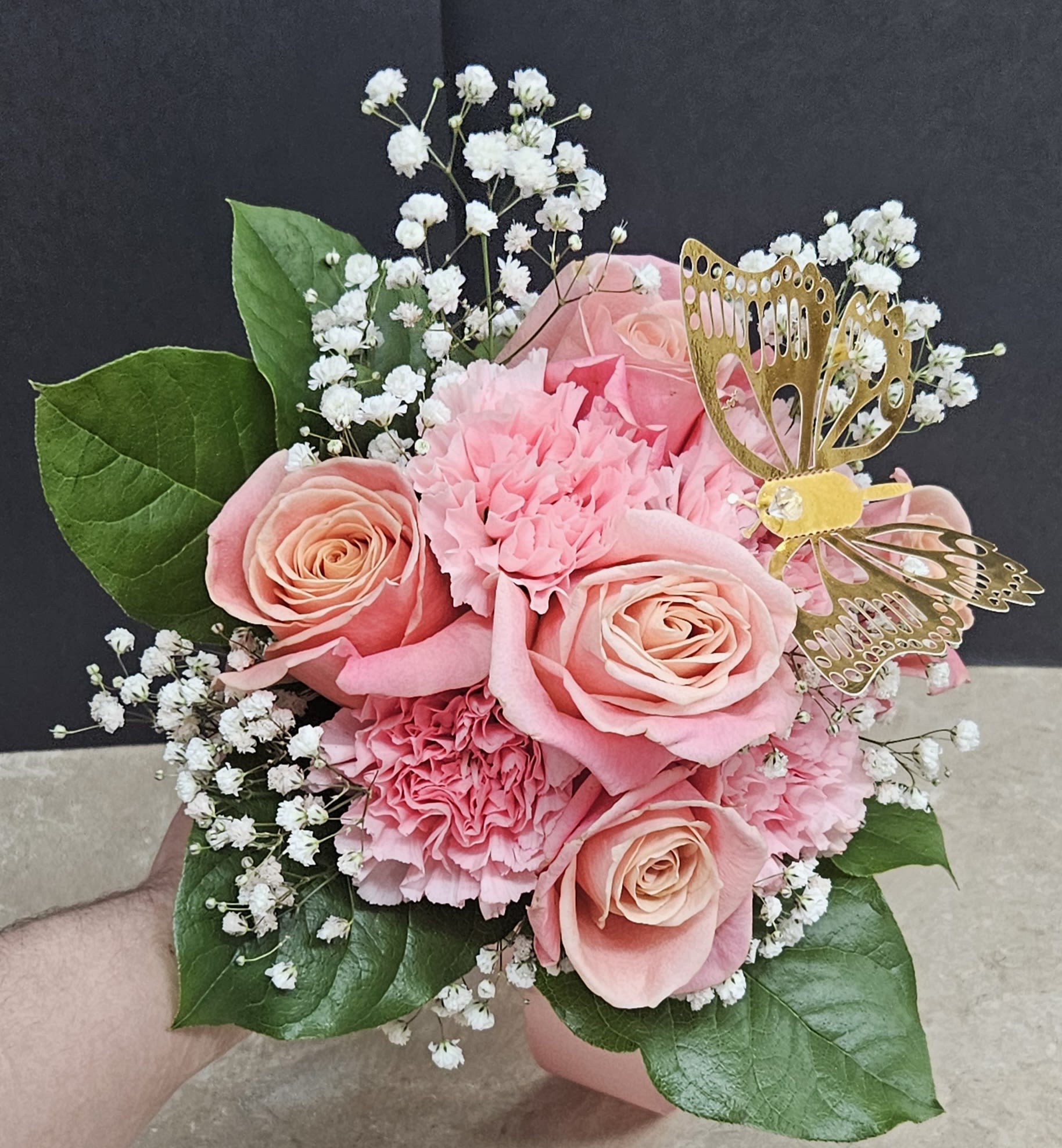 Girlfriend Bouquet Wrapped - Beautiful pink roses and carnations with baby's breath and butterfly wrapped. Vase not included