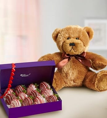 Lots of Love Lots of Love - Product ID: 102889 Satisfy her sweet toothâand her love of all things cute & cuddlyâwith the perfect âI love youâ gift. A box of 12 decadent strawberries, dipped and drizzled in chocolaty confections, is paired up with a soft plush bear for her to snuggle up with (but only when youâre not there!) 12-piece box includes 12 large strawberries dipped in milk and white chocolate and topped with red and pink drizzle All of our dipped fruit is covered in delicious milk and white chocolaty confection and red and pink chocolaty confections Hand-crafted and designed by local shops Arrives in a purple Fruit Bouquets branded box Delivered fresh to their door with Same-Day Delivery 10â plush bear with bow Allergy Warning: Fruit Bouquets products may contain peanuts and/or tree nuts. We recommend that you take the necessary precautions based on any related allergies.