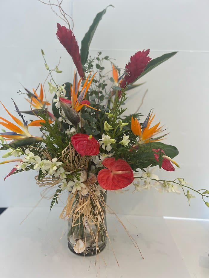 tropical Bliss 2 - Lovely arrangement full of colorful tropicals including but not limited to birds of paradise, ginger, anthurium.....flowers can be subject to substitution