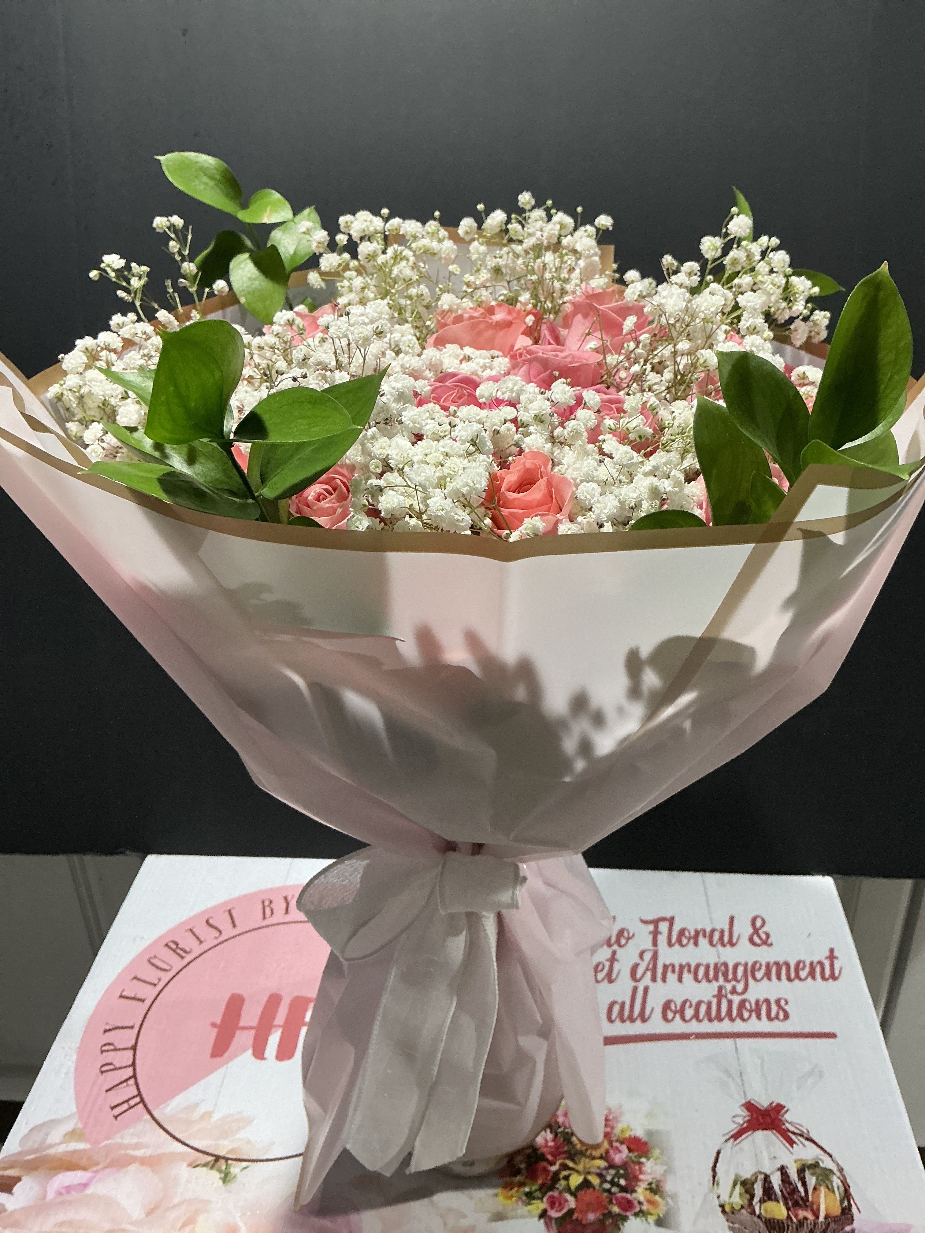 Gentleness - This pink  bouquet represent sweetness gentleness and admiration perfect gift for any special ocasión    24 pink roses  Fillerd gipsophilia greenery wrapped with korean paper no vase incluido 