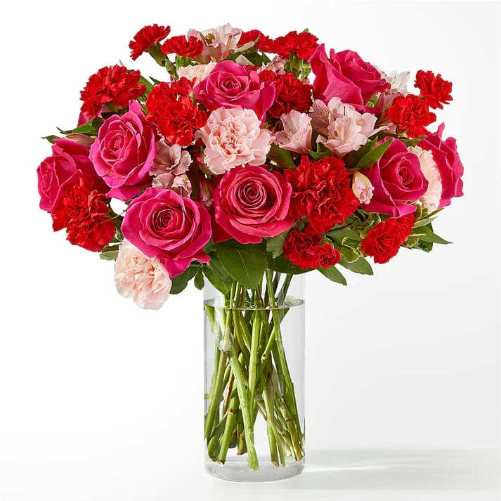 You're Precious Bouquet (Exquisite) You're Precious Bouquet (Exquisite) - Blushing shades of pink blooms are nestled in lush greens to charm anyone's day. This bouquet is abundant with a classic assortment of pretty florals – roses, alstroemeria and carnations to name a few. Details 15"h x 15"w