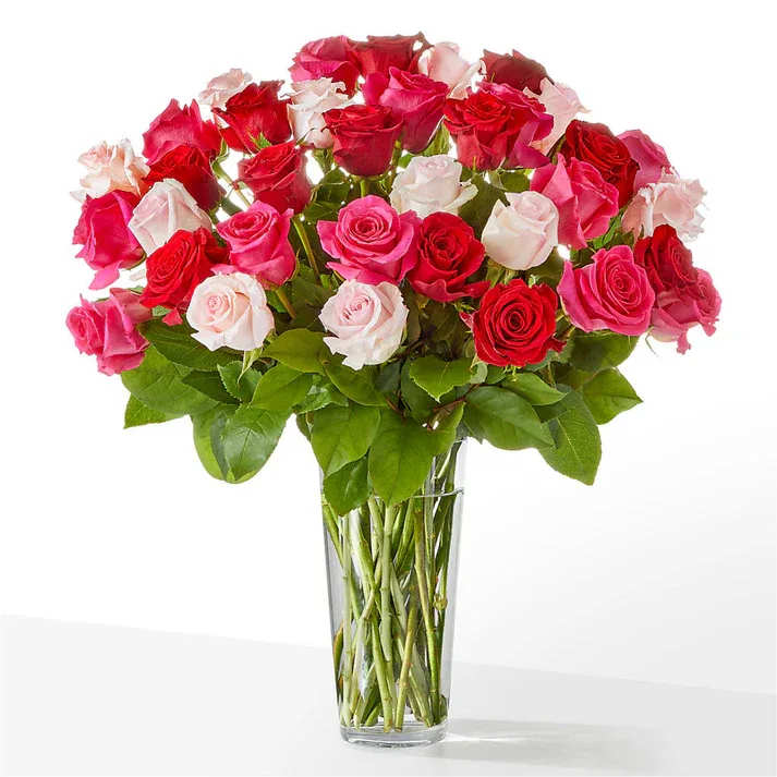 Charming Rose Bouquet (exquisite) Charming Rose Bouquet (exquisite) - Sweep them off their feet with a gorgeous blend of pink, hot pink and red roses. Details The Standard Bouquet is approximately 21"H x 18"W. Designed by florists, ready to display. For long–lasting blooms, replace the water daily. We suggest trimming the stems every couple days. Pet Safety Precautions: This bouquet or plant may include flowers and foliage that are known to be toxic to pets. To keep them safe, be sure to keep this arrangement out of your pet's reach.