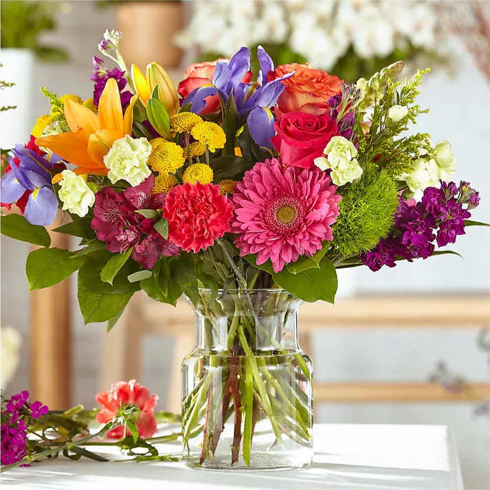Bold & Bright – A Florist Original (exquisite) Bold & Bright – A Florist Original (exquisite) - Prepare to be captivated by a glorious assortment of vibrant hues and exquisite blooms meticulously crafted by our talented designers. This enchanting arrangement bursts with energy, radiating a sense of joy and celebration. Our Florist Originals Bouquets are uniquely created and handcrafted by our artisan designers using the finest quality flowers. The colors or floral varieties used in this bouquet will vary based on freshness and availability.