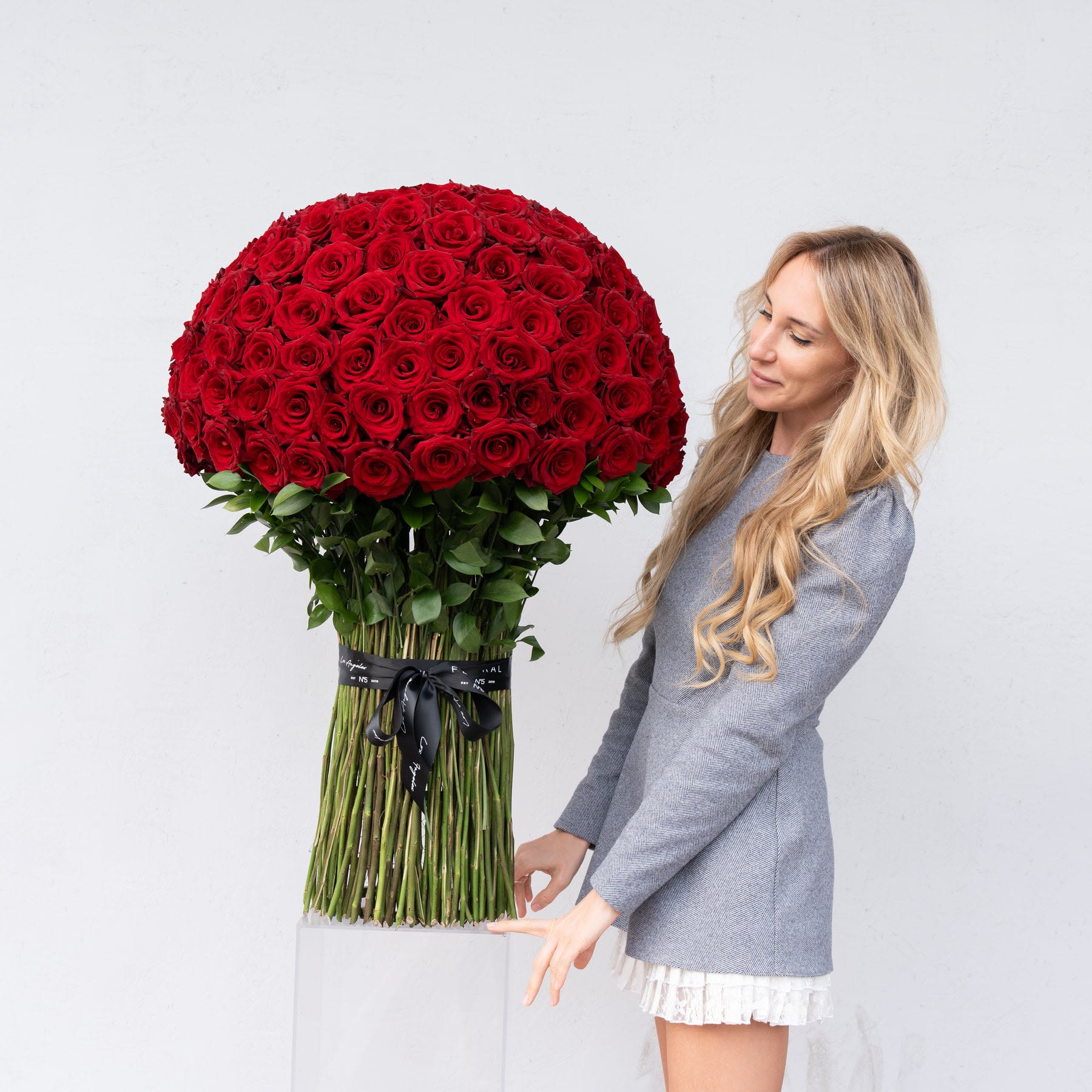NO.700-RED ROSE BOUQUET NO.700-RED ROSE BOUQUET - Handcrafted by our expert florist in Studio City, this giant bouquet features 300 classic red roses arranged with timeless elegance and care. Perfect for any occasion, it brings beauty and sentiment together in every petal. Enjoy the convenience of same day flower delivery, making it easy to send love and joy right when it matters most. Discover the charm of a rose bouquet that speaks volumes. No vase needed.