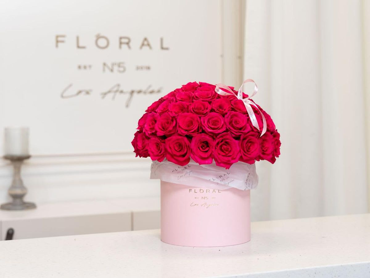 NO.826 - HI BARBIE NO.826 - HI BARBIE - Expertly arranged by our skilled florist in Studio City, this box of classic roses offers a modern twist on a timeless gesture. Elegant and refined, it's the perfect gift for any occasion. With same day flower delivery available, sending a stunning floral surprise has never been easier. Experience the beauty and sophistication of a luxurious rose presentation. Available in three size options and diverse box textures and colors: Standard size - 50 roses. Deluxe size - 75 roses. Premium size - 125 roses. On the photo: Size - Standard.
