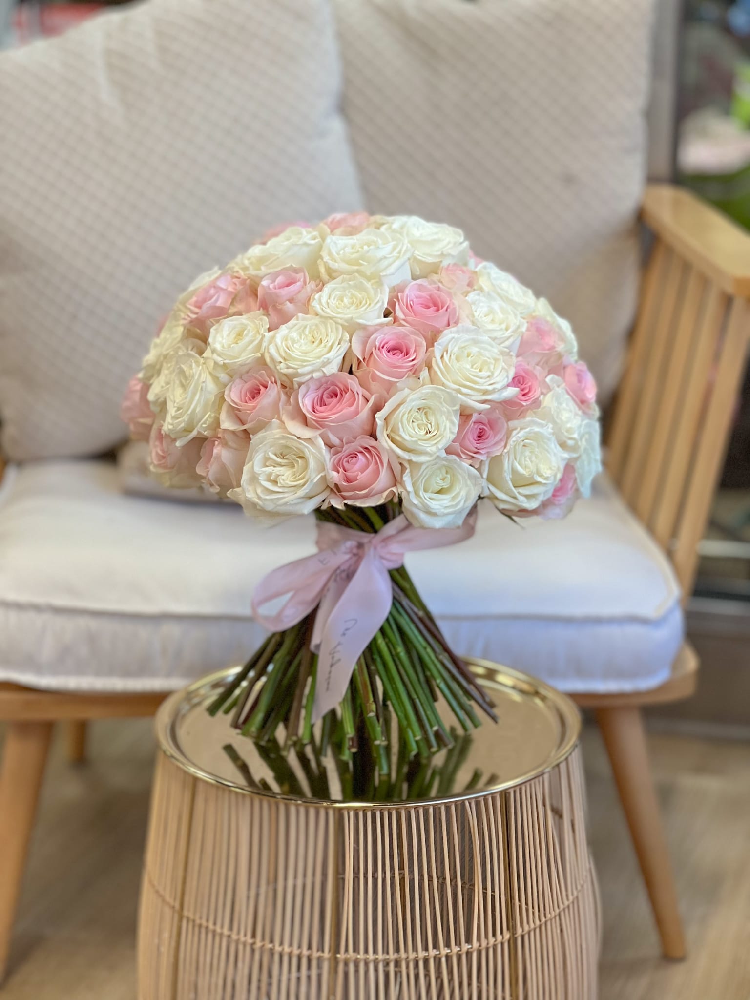 Sweet Love - FN5 Sweet Love - FN5 - Handcrafted by our expert florist in Studio City, this beautiful bouquet features mix of classic white and pink roses arranged with timeless elegance and care. Perfect for any occasion, it brings beauty and sentiment together in every petal. Enjoy the convenience of same day flower delivery, making it easy to send love and joy right when it matters most. Discover the charm of a rose bouquet that speaks volumes. Available in three size options: Size Standard - 50 roses Size Deluxe - 75 roses Size Premium - 100 roses