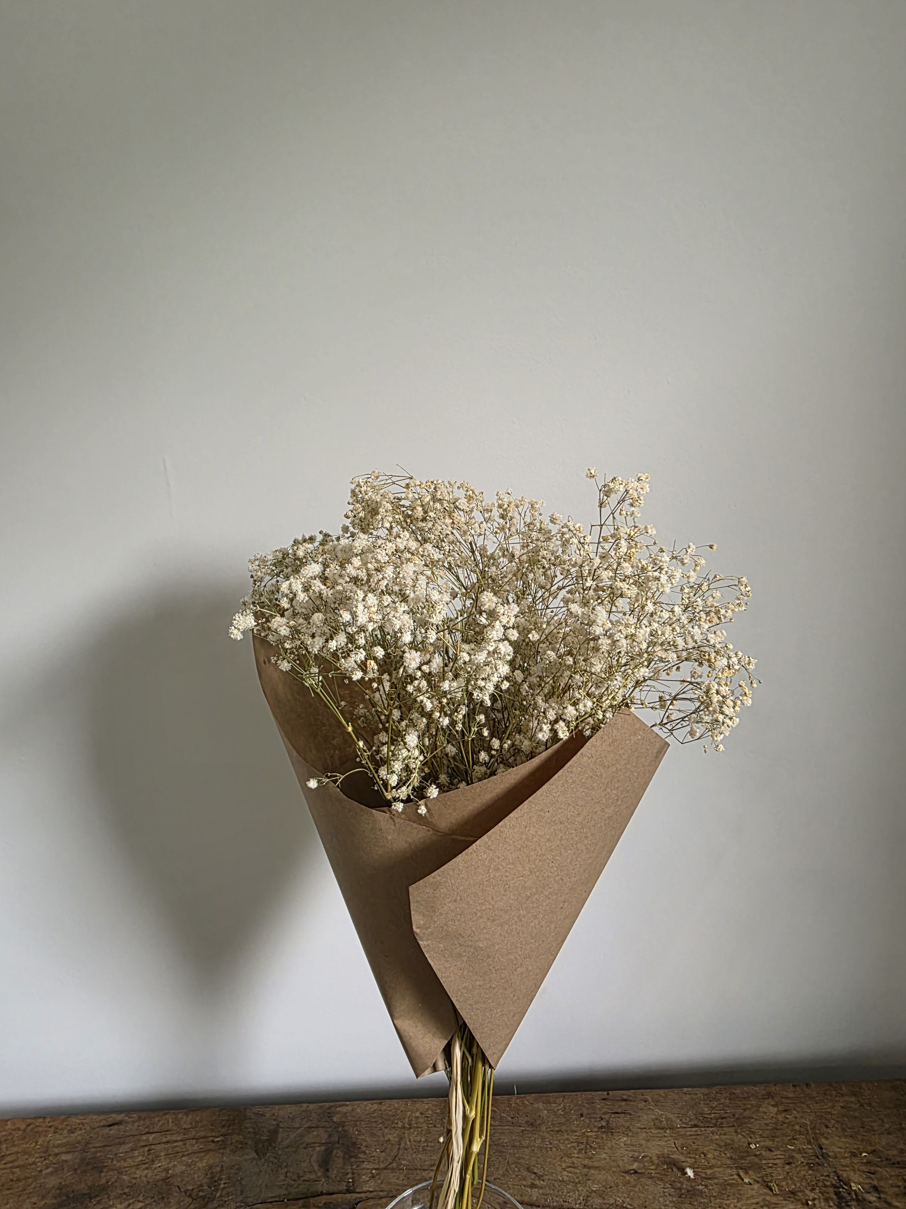 Dried Bunch - Baby's Breath Dried Bunch - Baby's Breath - Naturally beautiful and effortlessly timeless, our Dried Flower Bunches are perfect for styling vases, crafting arrangements, or adding a touch of texture to your space. Each bundle features carefully preserved botanicals with long-lasting color and structure—no water or upkeep needed. Mix and match for a custom look or let a single variety shine on its own. Gypsophila Baby's Breath
