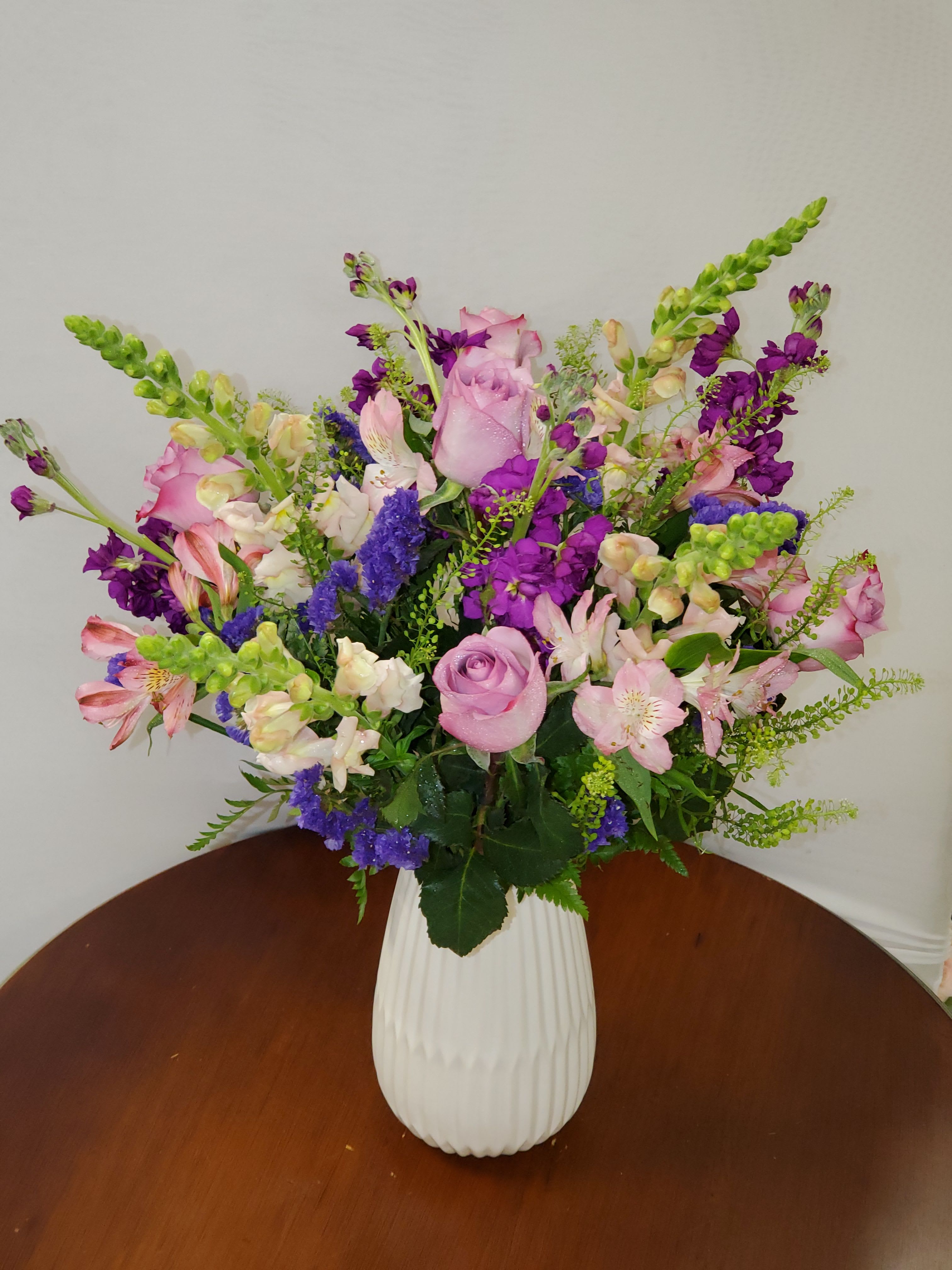 Classic Lavender  - Modern ceramic vase with a mix of lavender and purple flowers 