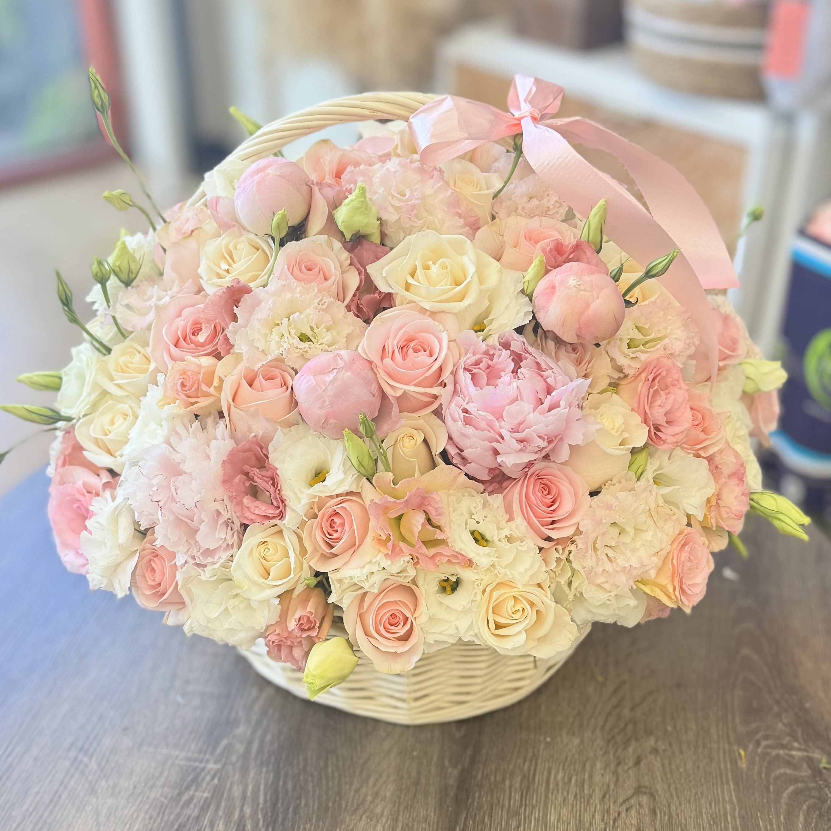 Blush Romance – Luxury Flower Basket - Soft, romantic, and unforgettable — this elegant flower basket features delicate pink peonies, premium roses, lisianthus, and hydrangeas, all artistically arranged in a white wicker basket and tied with a satin ribbon. Perfect for birthdays, anniversaries, baby showers, or simply to show love and appreciation.  Handcrafted by Hollywood Blooms, your premier Los Angeles florist specializing in luxury flower delivery. We offer same day flower delivery in Beverly Hills, West Hollywood, and across the LA area. Ideal for gifting or decorating special events, our signature flower baskets bring timeless beauty and joy.  Looking for flowers in a basket or luxury floral gifts in Los Angeles? This arrangement makes a graceful statement.