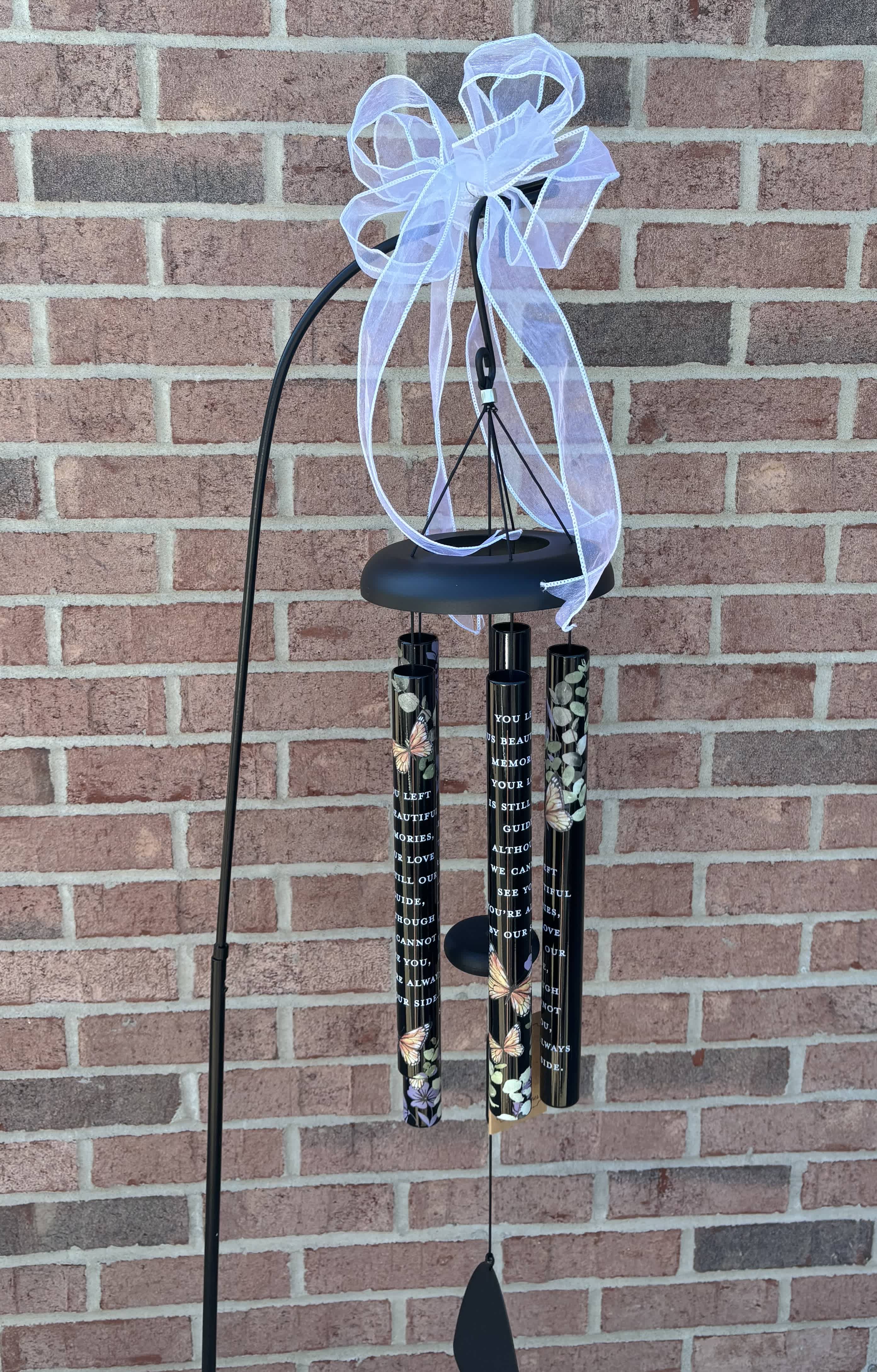 38&quot; PICTURESQUE SONNET CHIME DISPLAYED ON A STAND:  By Our Side - A &quot;lasting&quot; thoughtful tribute for those looking for a unique sympathy gift. Wind chime is displayed on a stand with greenery and bow, suitable for delivery to a funeral home/service. A cluster of roses or small bouquet of flowers may be added to enhance to look of this thoughtful gift as an upgrade. Printed on each chime is: &quot;You left us beautiful memories, your love is still our guide, although we cannot see you, you’re always by our side&quot; Also printed on each tine are rich jewel tone flowers, greenery and butterflies..The Picturesque Chimes are built to last with all aluminum construction, powder coated metal, and industrial cord. The tubes feature a UV printed sentiment and artwork. The striker is adjustable and all 5 tubes are 1 1/4&quot; in diameter.