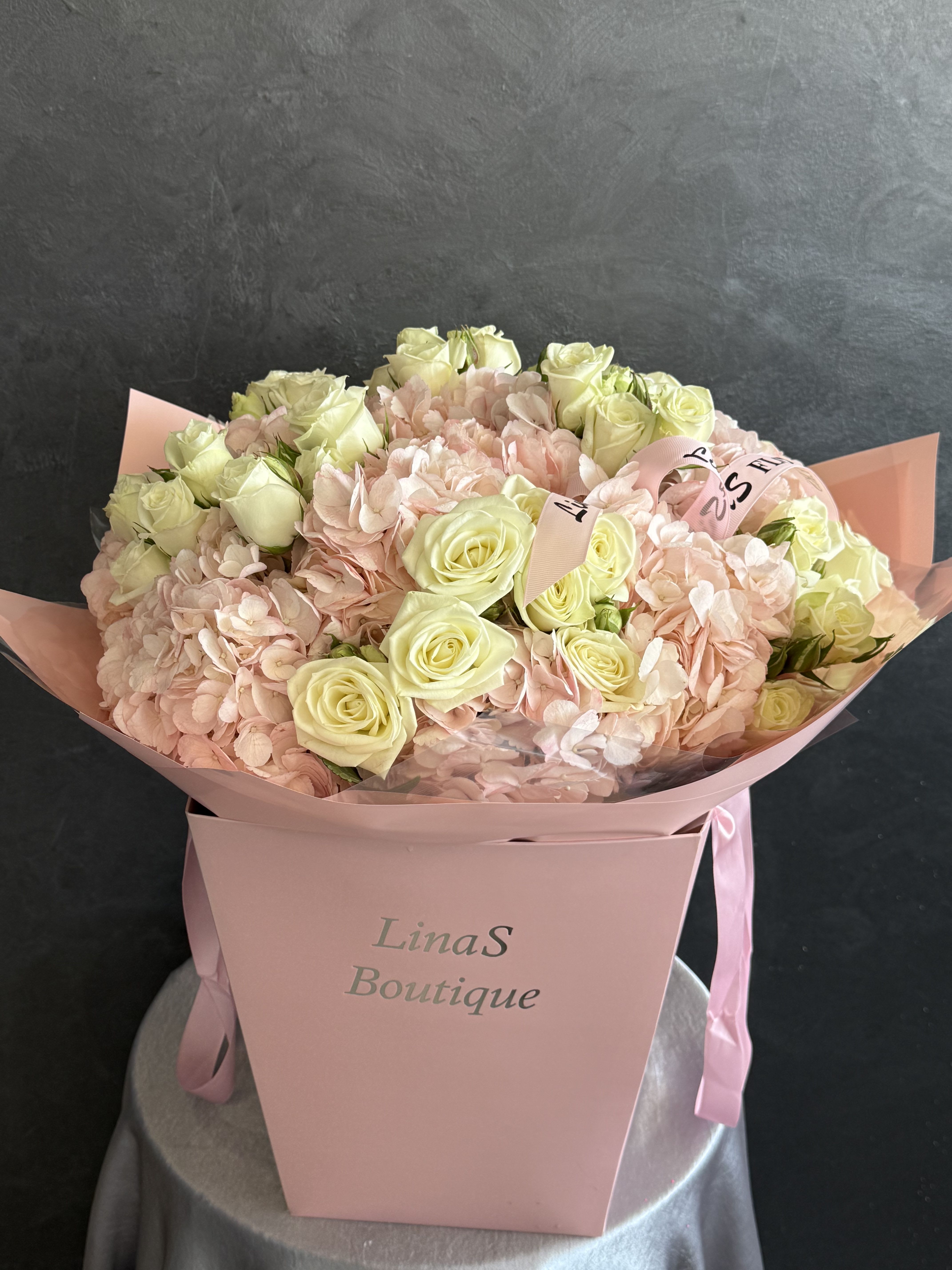 Vera Vera - A delicate blend of soft pink hydrangeas and elegant white roses — timeless, romantic, and gracefully charming.