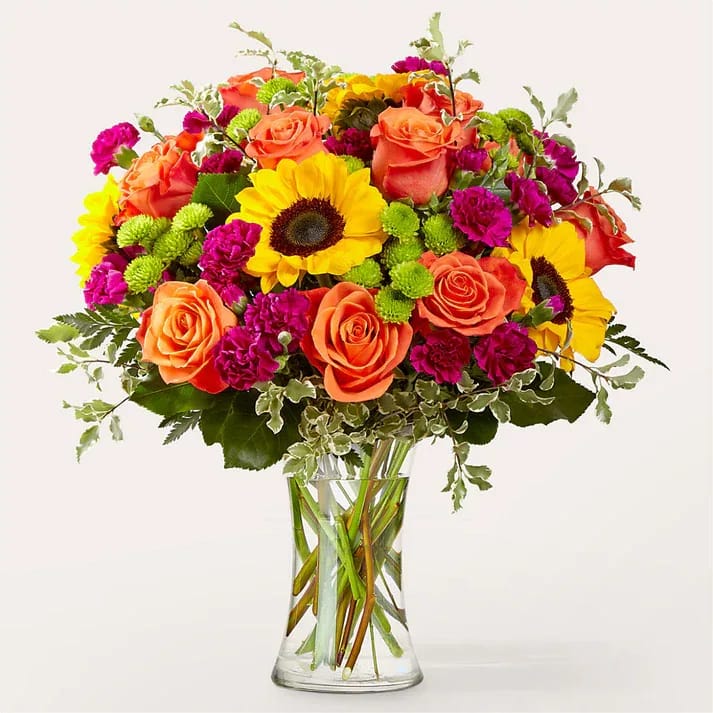 Warmth & Light Bouquet (exquisite) Warmth & Light Bouquet (exquisite) - No matter the weather, send some sunshine to their doorstep with the Warmth & Light Bouquet. Details Designed by florists, ready to display. For long–lasting blooms, replace the water daily. We suggest trimming the stems every couple days. Pet Safety Precautions: This bouquet or plant may include flowers and foliage that are known to be toxic to pets. To keep them safe, be sure to keep this arrangement out of your pet's reach.