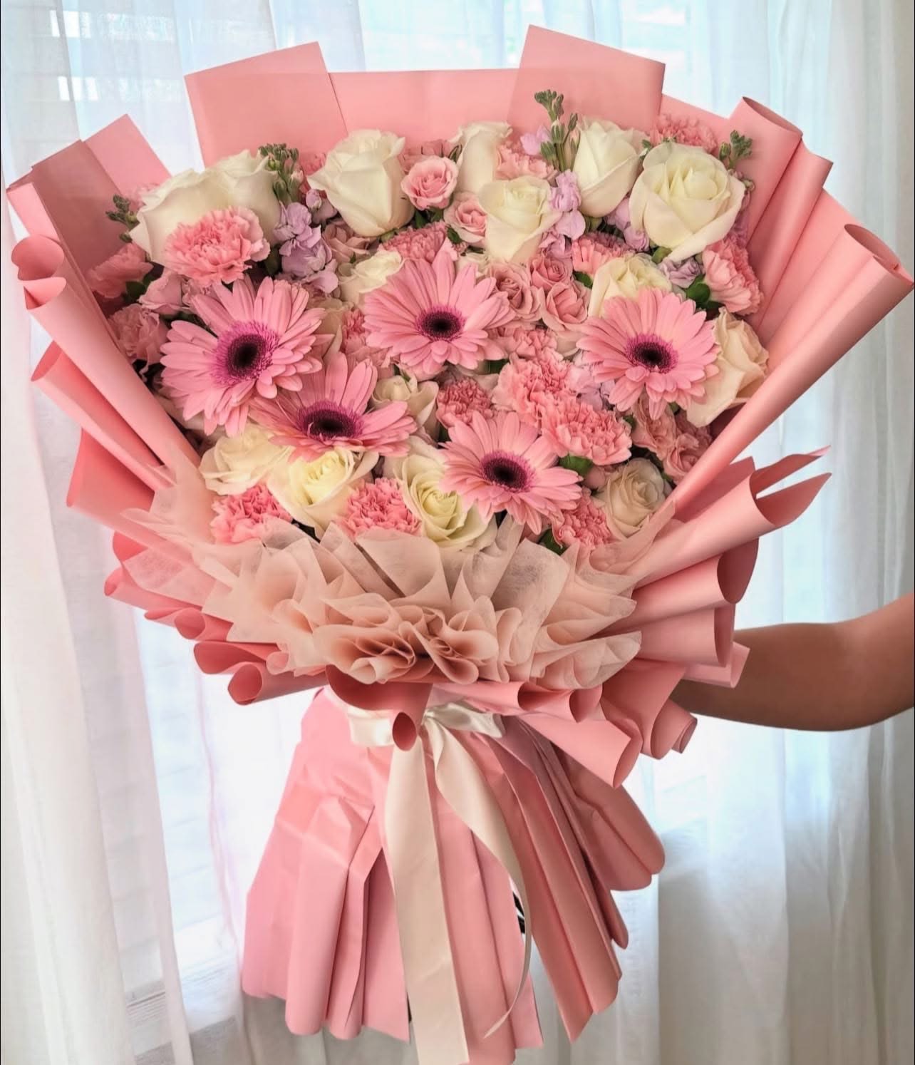 Sweet cotton candy bouquet Sweet cotton candy bouquet - Surprise her with this beautiful floral bouquet for any special occasion, consisting of white roses, carnations, baby roses, pink stock and pink gerberas, send flowers full of love, available every day