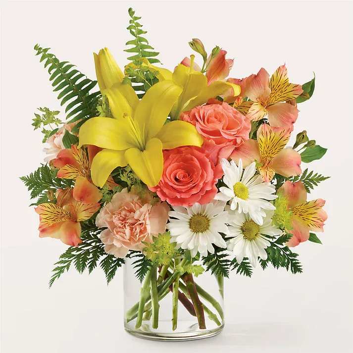 Sunset Strip Bouquet  - Give the gift of sunshine with these lush orange and yellow blooms fit for all of life’s highs and lows. Details Designed by florists, ready to display. For long–lasting blooms, replace the water daily. We suggest trimming the stems every couple days. Pet Safety Precautions: This bouquet or plant may include flowers and foliage that are known to be toxic to pets. To keep them safe, be sure to keep this arrangement out of your pet's reach.