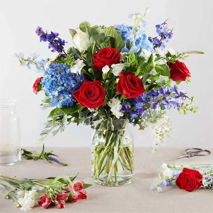 Star Spangled - A Florist Original (exquisite) Star Spangled - A Florist Original (exquisite) - Raise a flag of flowers for America's holidays. Our Florist Originals Bouquets are created by local florists using the finest quality flowers. The actual design you or your recipient will receive will be different from the images shown here.