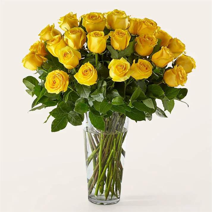 Long Stem Yellow Rose Bouquet (exquisite) - Nothing brightens someone's day quite like the sunny shade of yellow. While vibrant yellow roses are a symbol of friendship, this bouquet makes a welcomed gift for any loved one. Details The Deluxe Bouquet is approximately 21&quot;H x 17&quot;W. A bouquet of 18 roses and foliage. Designed by florists, ready to display. For long–lasting blooms, replace the water daily. We suggest trimming the stems every couple days.