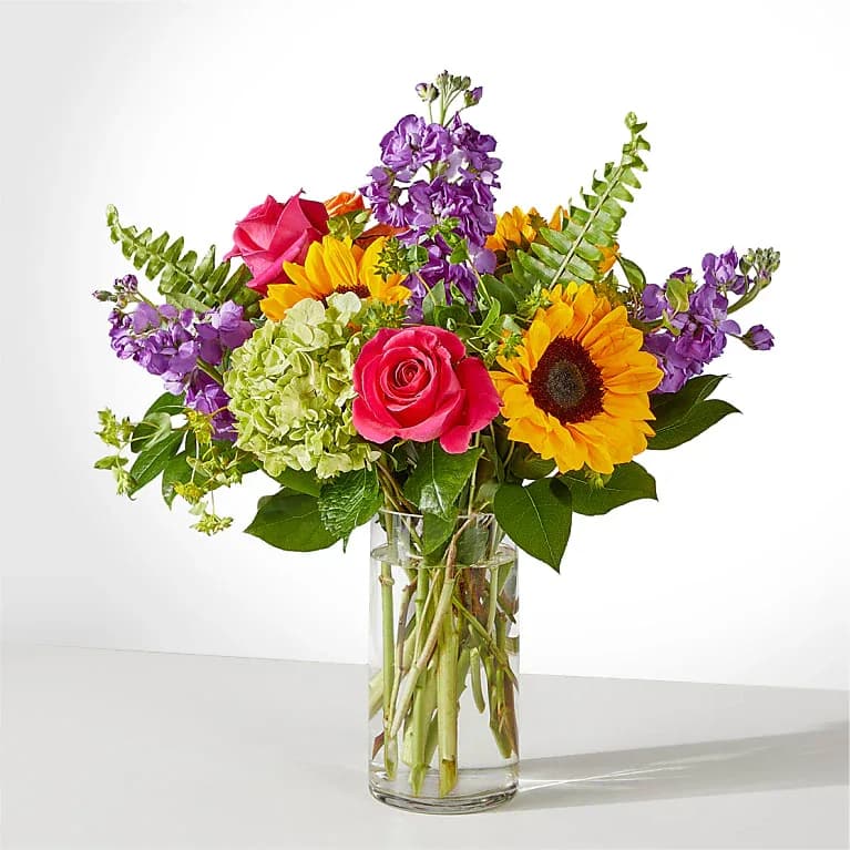 Vibrant Greetings - Feel the beauty and joy of the rainbow with this colorful gift. The Vibrant Greetings Bouquet lends itself to all of life's moments.  Design may change due to availability.