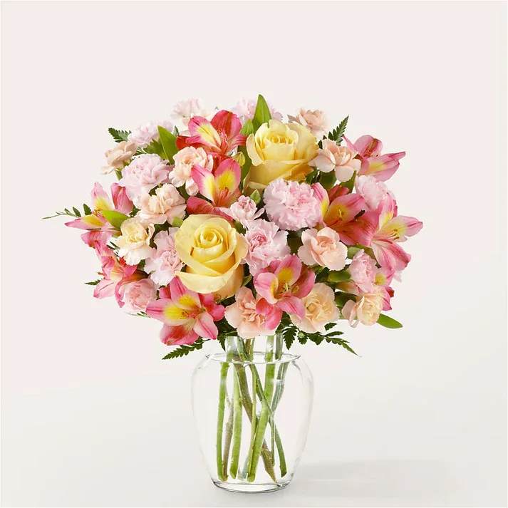 Just Lovely Bouquet  - Together pale yellow and pink stems make a chic statement, turning every day into a lovely one. Details Designed by florists, ready to display. For long–lasting blooms, replace the water daily. We suggest trimming the stems every couple days. Pet Safety Precautions: This bouquet or plant may include flowers and foliage that are known to be toxic to pets. To keep them safe, be sure to keep this arrangement out of your pet's reach.