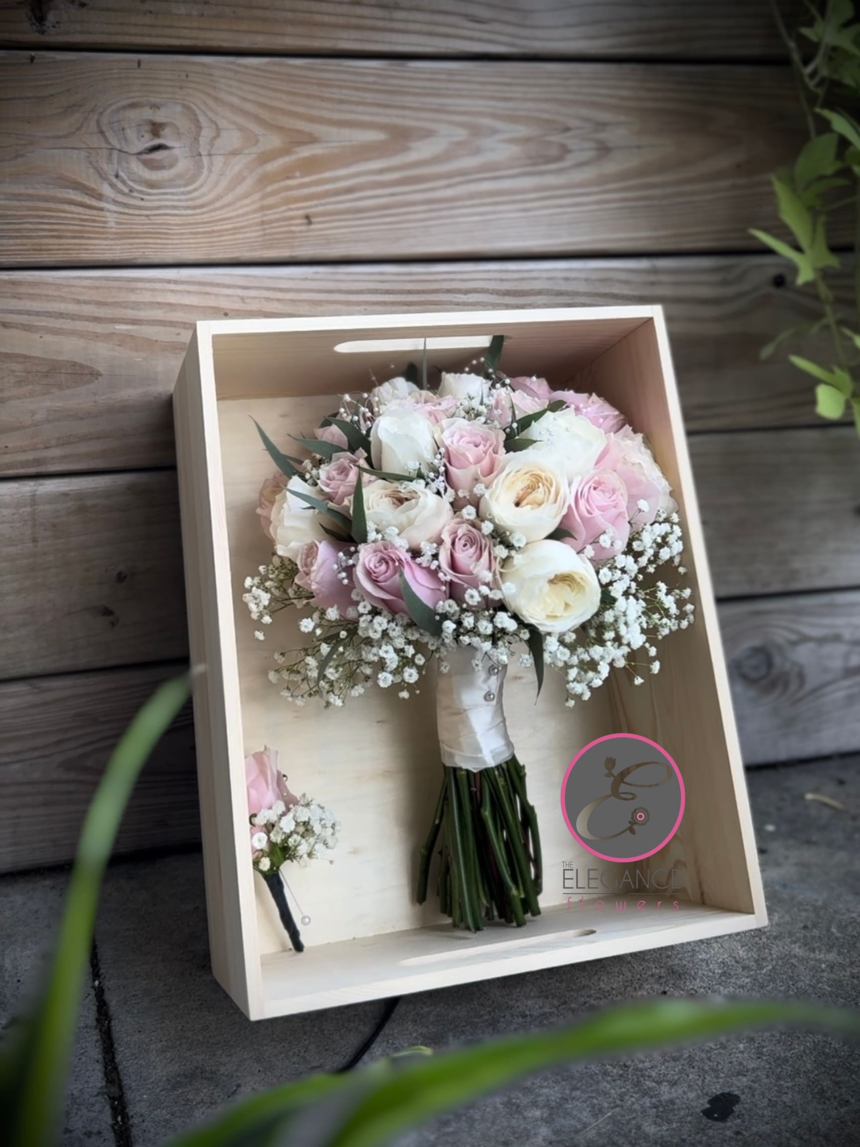 Bridal Bouquet #2 Bridal Bouquet #2 - A bridal bouquet is a beautifully arranged collection of fresh flowers, carefully selected to complement the bride's style and wedding theme. It often features classic blooms like roses, peonies, or lilies, mixed with greenery and other seasonal flowers, arranged to create a harmonious and elegant design.