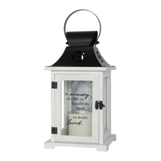 Lantern with Frame 'In Memory' - Lantern 'In memory of a life so beautifully lived, a heart so deeply loved.' Flameless LED candle lantern made from quality wood with metal top. Built-in 4&quot;x6&quot; picture frame. Built-in automatic timer, 6hrs ON/18hrs OFF. 3 AAA batteries included. Indoor use recommended. 57465 Approximately 6&quot;W x 13&quot;H