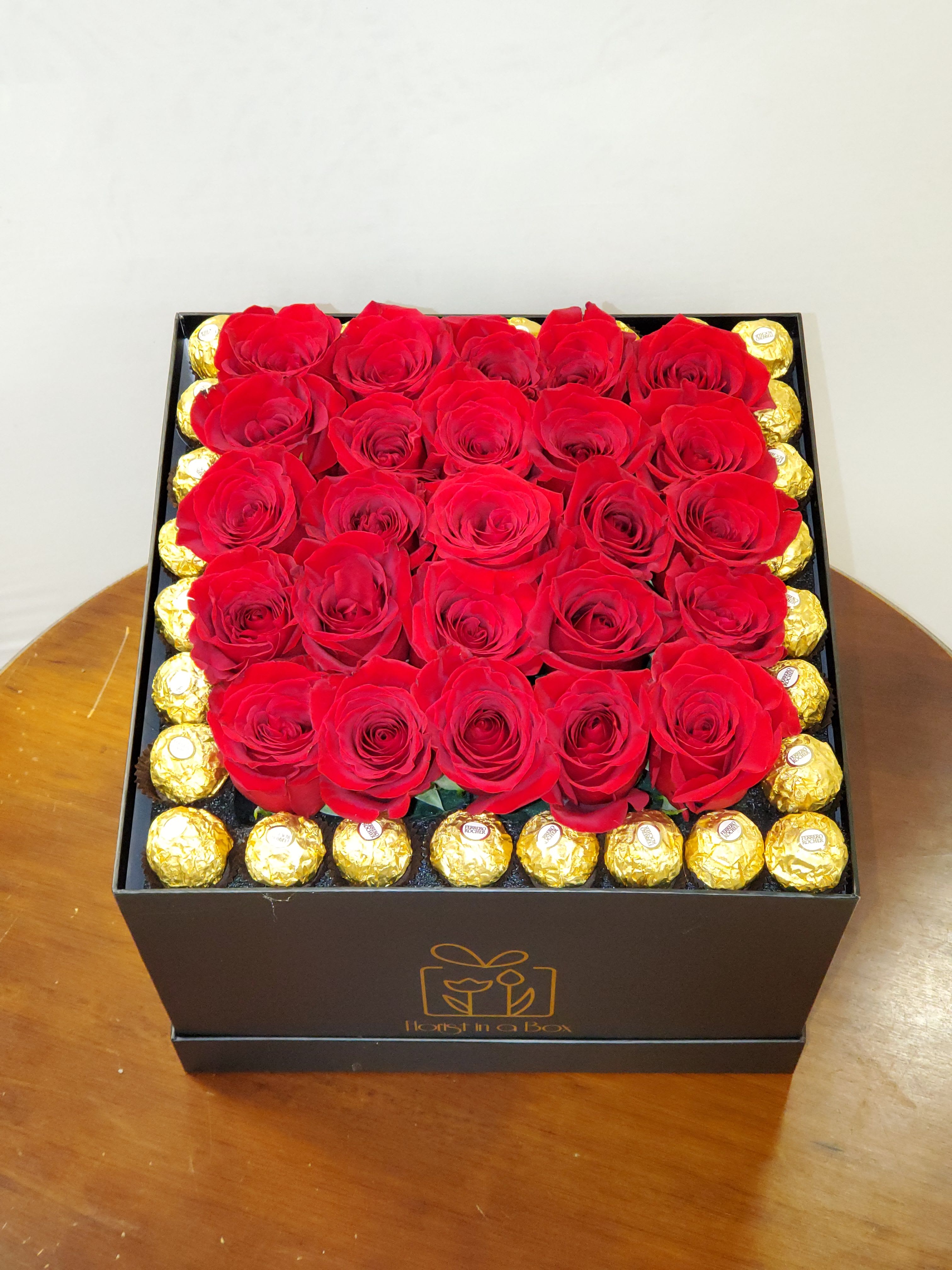 Elegant roses in a box  - Elegant roses in a box surrounded by chocolates NOTICE BOX MAY BE DIFFERENT DEPENDING ON AVAILABILITY!!!  