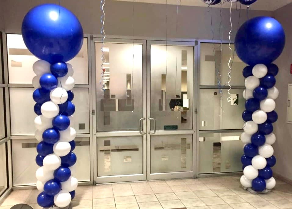 2 Spiral Balloon Columns - Columns like these are very impressive, standing about 8' tall. They are great for entrances or anywhere you need them! Each column comes with a weighted base and a 3' balloon topper. A delivery fee of $25 is additional. All hardware is rented only. Must be returned to Campus Floral with in one week of event. If not returned, additional charges will be applied. All balloon sales are FINAL.