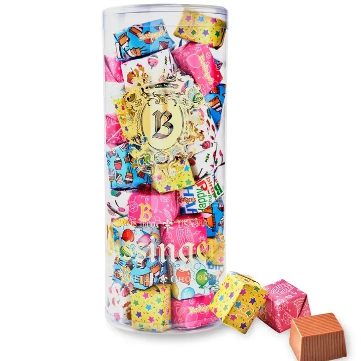 Bissinger's Solid Milk Chocolate Birthday Presents Tube - Our miniature solid milk chocolate foil-wrapped birthday presents are the perfect way to celebrate anyone's birthday! Made with Bissinger's 38% European milk chocolate and packaged in a clear tube.  Each present was designed by Bissinger's creative team and bears the Bissinger's logo and signature &quot;B&quot; on each present. 
