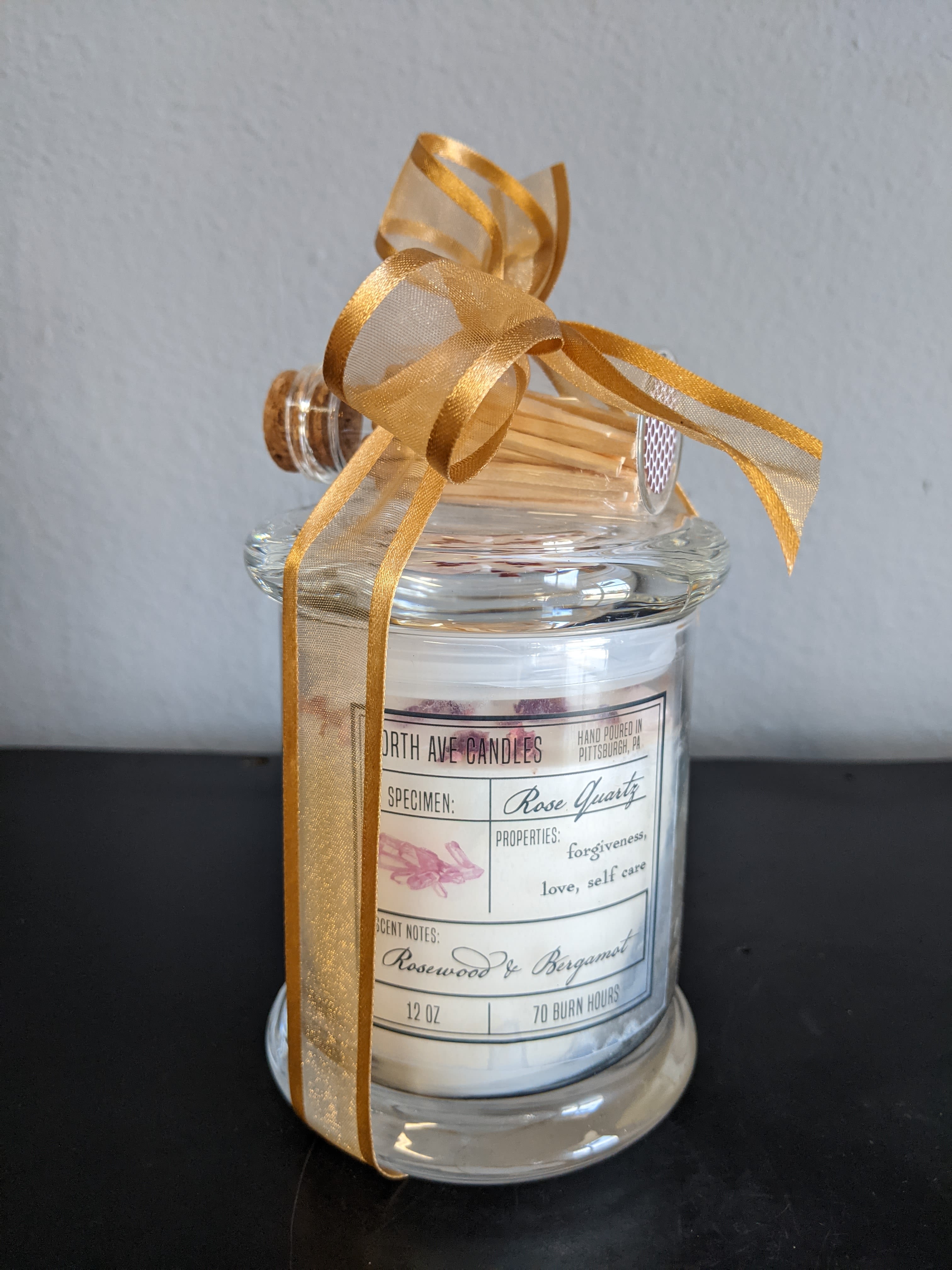 Rose quartz crystal candle - Rose quartz crystal candle. Rosewood and Bergamot.12 Oz. 70 burn hours with Apotechary match vial (40 matches &amp; striker) glass &amp; cork.