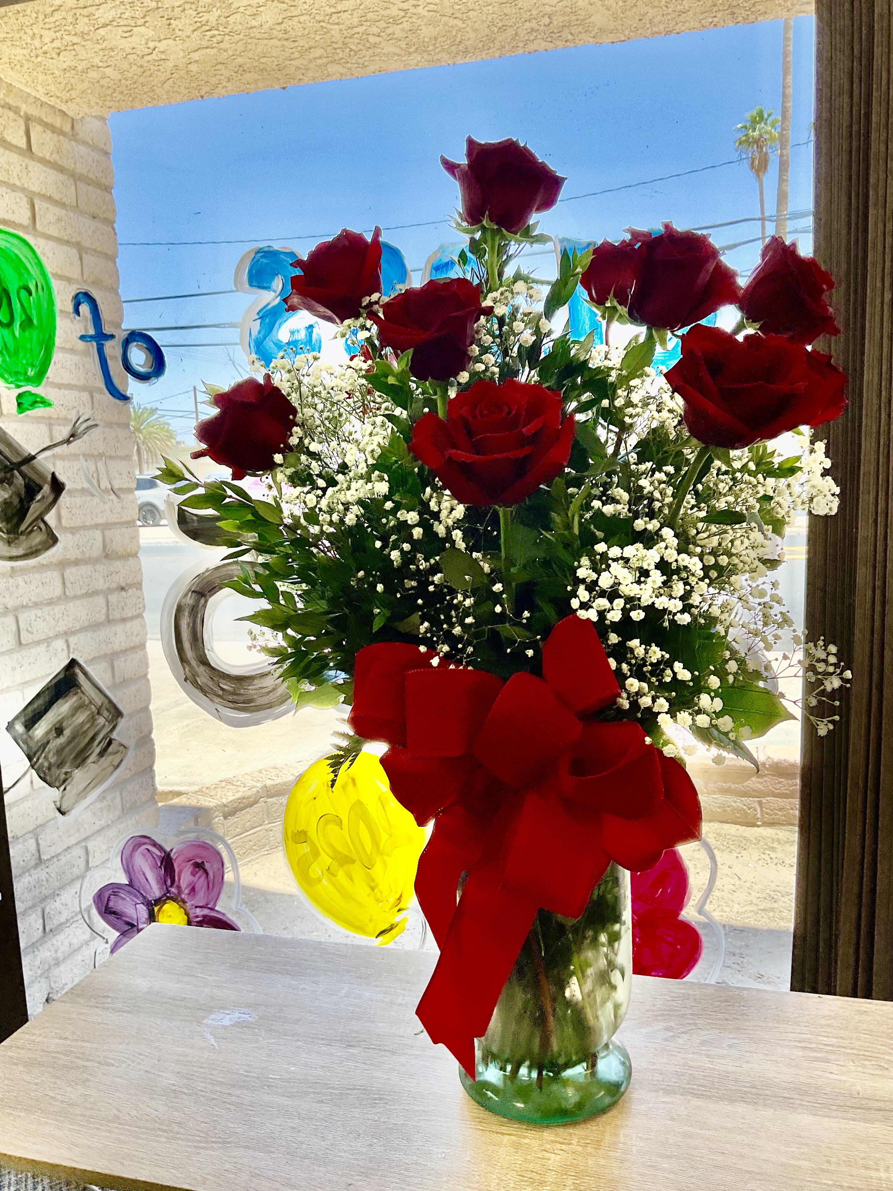 Dozen Red Roses  - Fresh  twelve red roses with baby breath , leather and lemon leaves 
