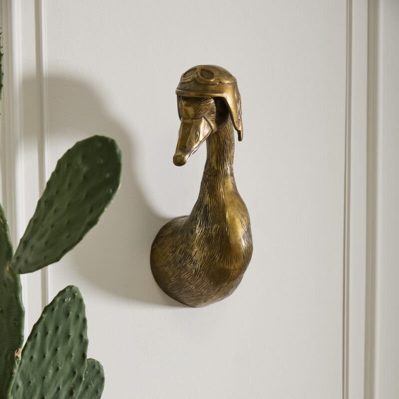 Charlie- E+E Wall Mount - Part of Accent Decor's E+E collection designed by artist Jessica Heimstra. A delightful sight for the wall, this duck shaped cast aluminum mount is all set for display. A keyhole in the back of the piece allows for hanging securely. Size: 6.75&quot;x 18&quot;