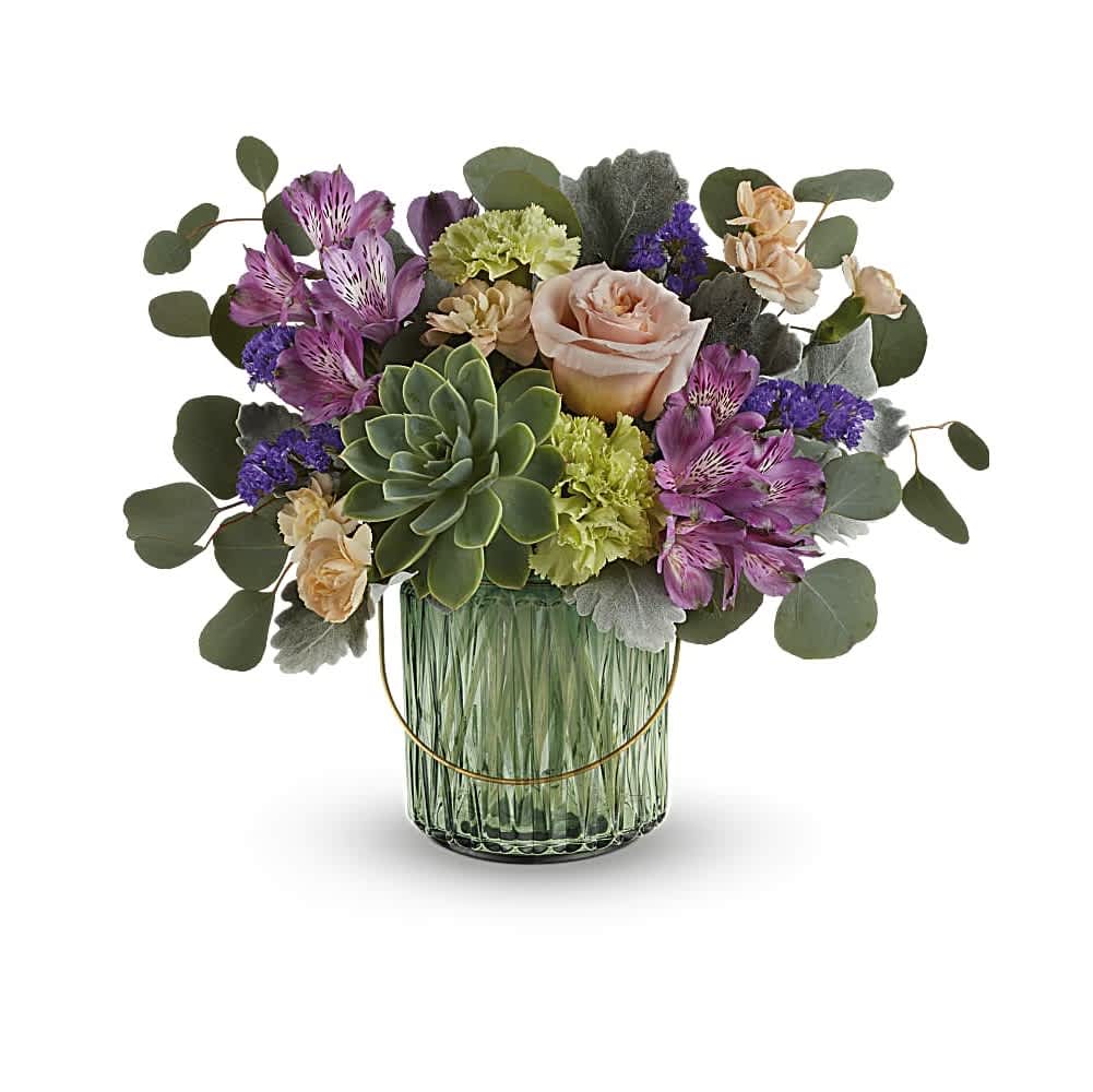 Storybook Rose Bouquet - Straight out of a storybook, this enchanting bouquet is right at home in this whimsical sage green glass lantern with golden handle. Lovely as a candleholder in seasons to come! This bouquet includes peach roses, purple alstroemeria, green carnations, miniature peach carnations, purple sinuata statice, dusty miller, silver dollar eucalyptus and a large potted green echeveria succulent. The Storybook Rose Bouquet is delivered in the Lush Garden Lantern which becomes the perfect piece of home décor.