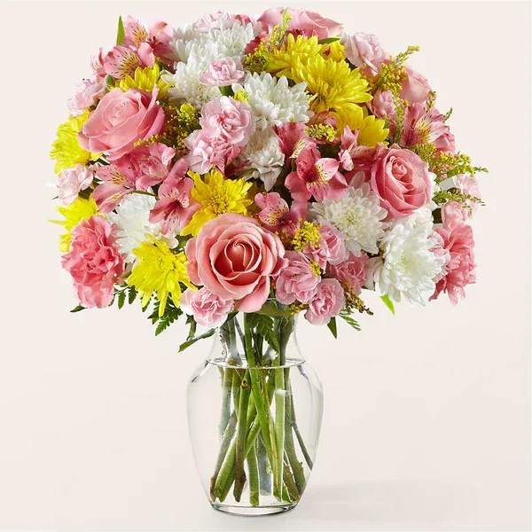 Creme de la Creme Bouquet (exquisite) Creme de la Creme Bouquet (exquisite) - Fun and feminine, this mix of white, pink and yellow florals is a delicate way to share in all of life's moments. Details Designed by florists, ready to display. For long–lasting blooms, replace the water daily. We suggest trimming the stems every couple days. Pet Safety Precautions: This bouquet or plant may include flowers and foliage that are known to be toxic to pets. To keep them safe, be sure to keep this arrangement out of your pet's reach.