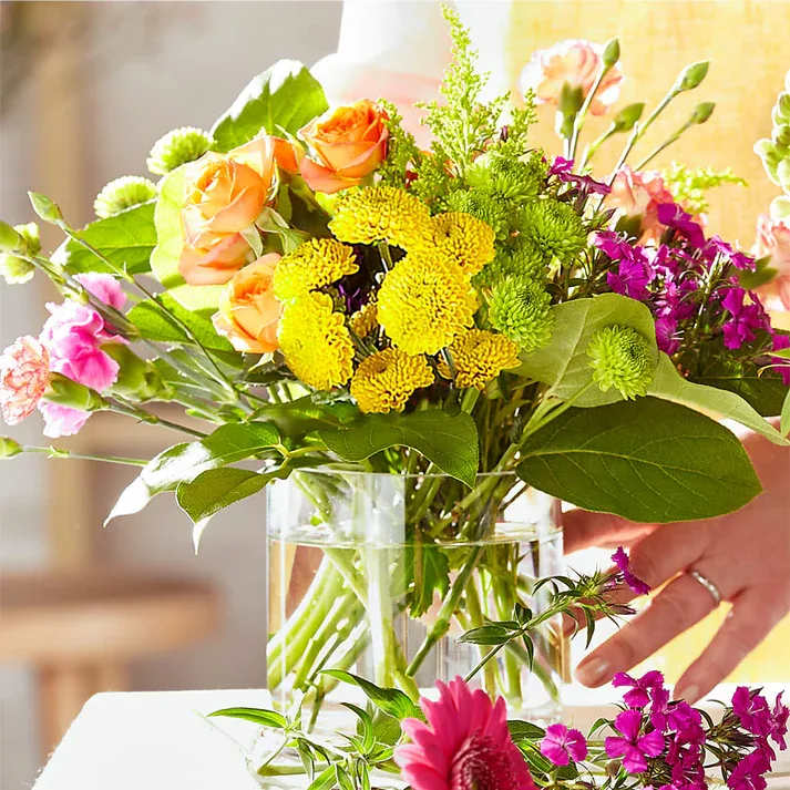 Bold &amp; Bright – A Florist Original  - Prepare to be captivated by a glorious assortment of vibrant hues and exquisite blooms meticulously crafted by our talented designers. This enchanting arrangement bursts with energy, radiating a sense of joy and celebration.  Our Florist Originals Bouquets are uniquely created and handcrafted by our artisan designers using the finest quality flowers. The colors or floral varieties used in this bouquet will vary based on freshness and availability.