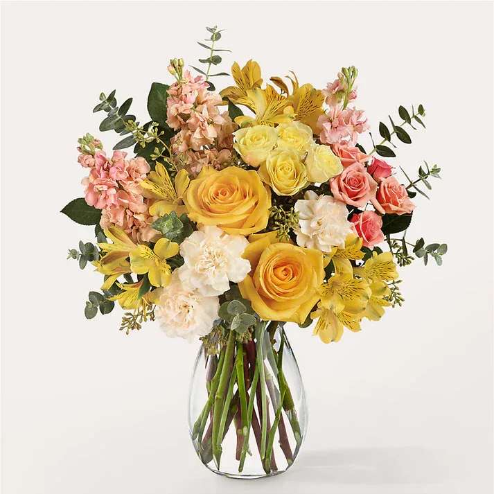 Slice of Sunrise Bouquet  - Like opening the windows to a sparkling morning, this mix of light yellows and peach is a positive way to start their day. Details Designed by florists, ready to display. For long–lasting blooms, replace the water daily. We suggest trimming the stems every couple days. Pet Safety Precautions: This bouquet or plant may include flowers and foliage that are known to be toxic to pets. To keep them safe, be sure to keep this arrangement out of your pet's reach.