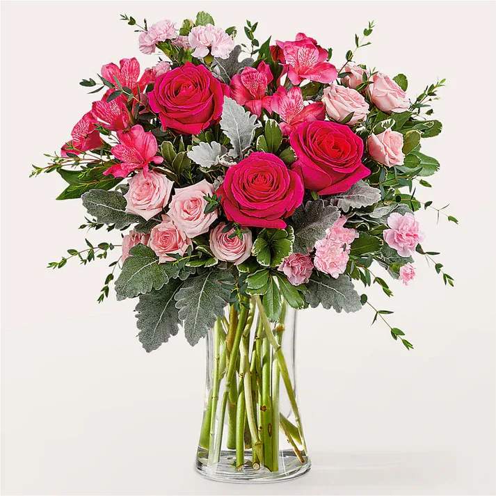 Tickled Pink Bouquet  - Bring a smile to their face with the Tickled Pink Bouquet, a delightful mix of varying shades of pink roses, carnations, and alstroemeria. Details Designed by florists, ready to display. For long–lasting blooms, replace the water daily. We suggest trimming the stems every couple days. Pet Safety Precautions: This bouquet or plant may include flowers and foliage that are known to be toxic to pets. To keep them safe, be sure to keep this arrangement out of your pet's reach.