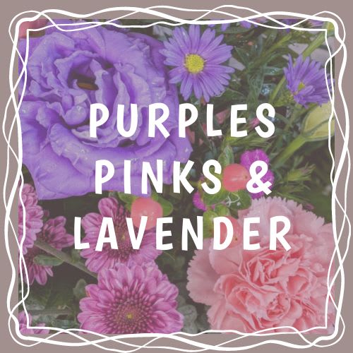 Pinks, Purples &amp; Lavender Arrangement  - Vased - Embrace the enchanting beauty of our Pinks, Purples, and Lavender Arrangement. This captivating bouquet features a delightful mix of fresh blooms in shades of lovely pinks, luxurious purples, and soothing lavender. Expertly arranged to create a harmonious blend of colors and textures, it’s a perfect choice to convey admiration, appreciation, or love for any occasion.  The designs we create are custom and the blooms and containers will vary. We use the freshest product available to create the perfect floral combination for the recipient. If you have any special requests, please add those in the &quot;special instructions&quot; portion of your order to help us dial in your vision. Otherwise, our skilled designers, Sara &amp; Brett, will take it from here!  *Please note that photos are examples only – floral selection will vary.*  Standard Size is an excellent desk top size Approx. Dimensions: 12”H x 9”W  Deluxe Size is a great centerpiece size (thinking table size) Approx. Dimensions: 16”H x 12”W  Premium Size is a wonderful size for an island, showroom or office Approx. Dimensions: 20”+H x 16”+W