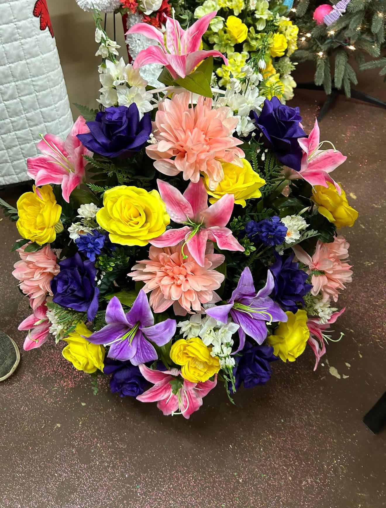 Silk Sympathy Basket Arrangement - Our Silk Sympathy Basket Arrangements are a beautiful way to offer comfort and show you care. These one-sided designs are filled with fresh flowers and greenery, thoughtfully arranged to be displayed at funeral services, memorials, or sent directly to the family. Each basket is made with love and designed to bring a sense of peace during a difficult time.  Designer’s Choice Call For Custom Colors or Flower Requests (870) 352-0273
