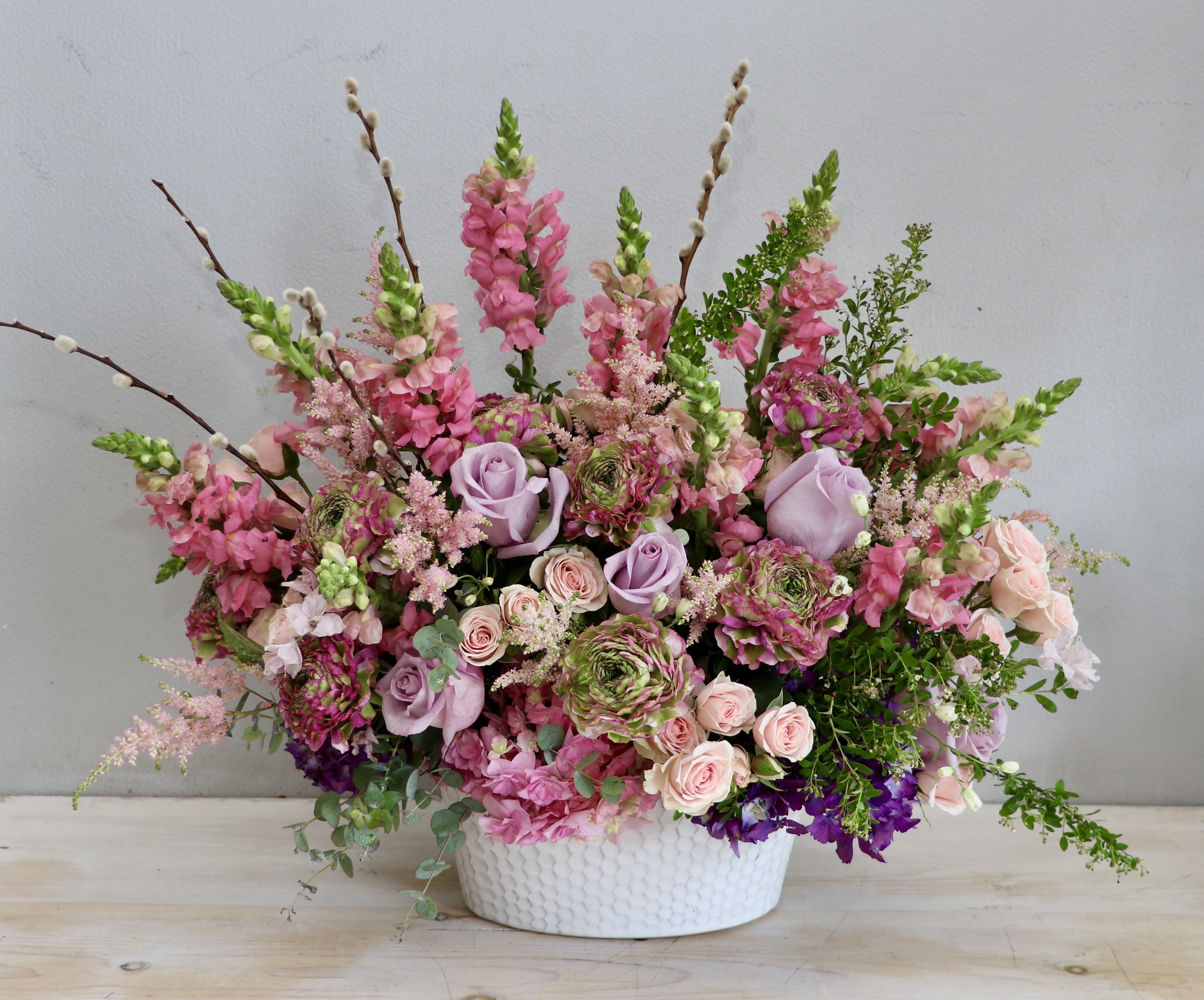 The Blooming Hour - My Glendale Florist The Blooming Hour - My Glendale Florist - This arrangement displays a mix of roses, snapdragons, and rich ranunculus with lush hydrangeas for a grand look. Note that this arrangement is one-sided.