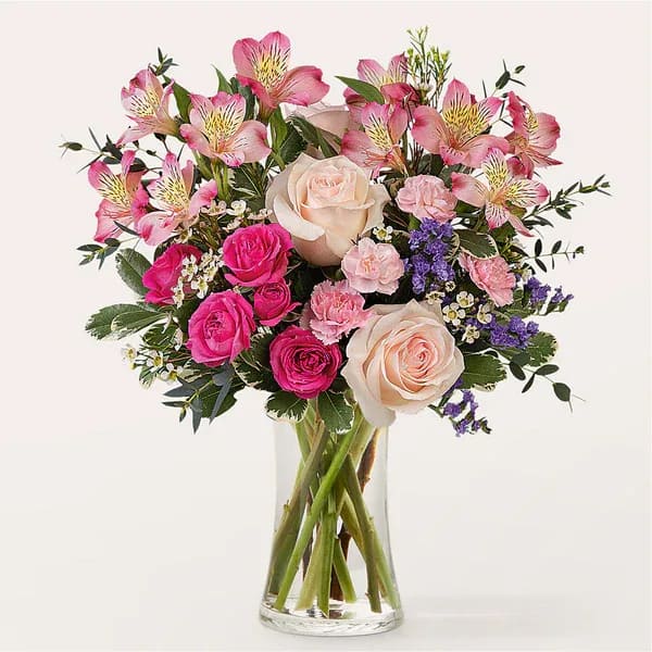 A La Mode Bouquet  - Chic and stylish, this modern design is just the effortless pop of color and presence you're looking for to make a day brighter. Details Designed by florists, ready to display. For long–lasting blooms, replace the water daily. We suggest trimming the stems every couple days. Pet Safety Precautions: This bouquet or plant may include flowers and foliage that are known to be toxic to pets. To keep them safe, be sure to keep this arrangement out of your pet's reach.