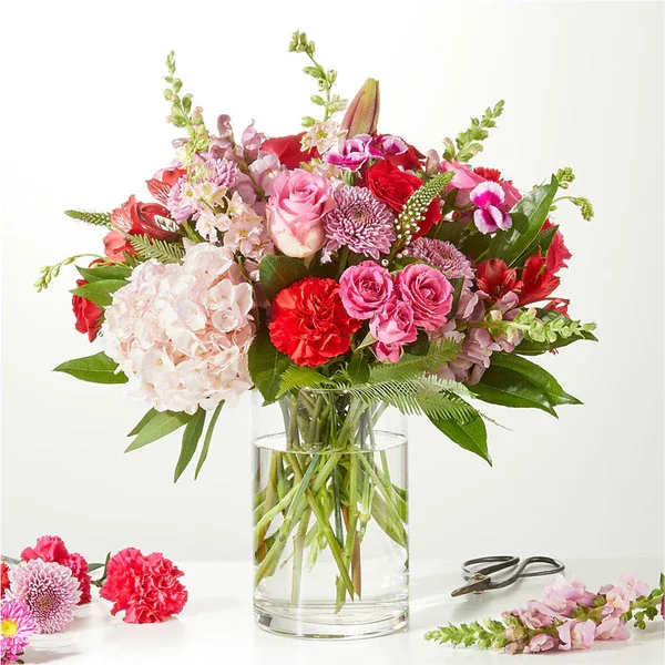 Swooning Over You - A Luxury Florist Original  - Romance is alive with this lux florist original, hand-selected florals sure to make their day. Our Florist Originals Bouquets are created by local florists using the finest quality flowers. The actual design you or your recipient will receive will be different from the images shown here.