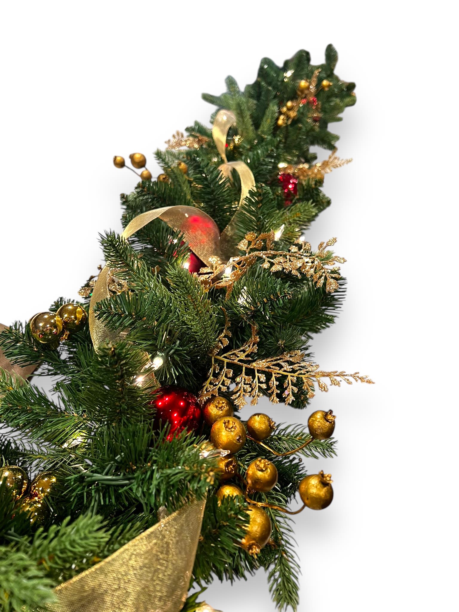 Holiday Garland Rental (9FT Man-Made Pine)  - Pre-Lit Christmas Garland: This 9 FT Christmas garland comes pre-strung with warm white lights. This pre-lit garland is only used for INDOOR spaces like home or office space. Standard Power Outlet: The garland uses a standard plug and extension cord when needed. This feature allows to drape it over a mantle, wrap it around a staircase, or display it on a table centerpiece.  Charming Ornaments and Ribbons: Adorned with an assortment of red and gold ornaments, ribbons, and bows, this garland adds a touch of festive elegance to your space. Substitution options are Royal Blue/Gold, White, or Green/Gold. Installation Process: To ensure a smooth installation, we will schedule a meeting about 3 weeks before installation to assess set up feasibility.  Terms and Conditions: The price indicated includes the installation and removal process, as well as all materials and labor. This option is for rental only and all materials will be taken upon removal. Please note: It can take up to a week for us to prepare your order. If your order is placed within too short of notice, we may need to call and reschedule for a later date.  Decorations will be instilled and removed by our team. Set up and removal are dependent on scheduling availability.   Sol Ambiance has the right to modify designs which may differ from the photo, but colors and overall look will remain the same.   If you have any questions about this service or looking for customization options, please email FLORIST@SOLAMBIANCE.COM