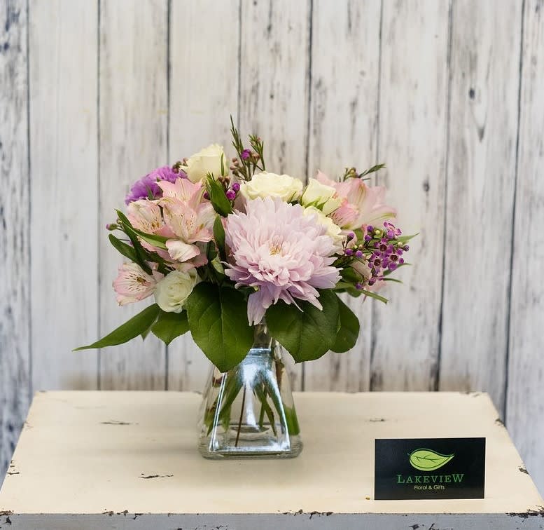 Jewel - Soft, spring blooms in lavenders, pinks and whites offer a calming ambience. A perfect gift to show appreciation, adoration or celebration!  Approximate Dimensions: 10&quot; T x 10&quot; W