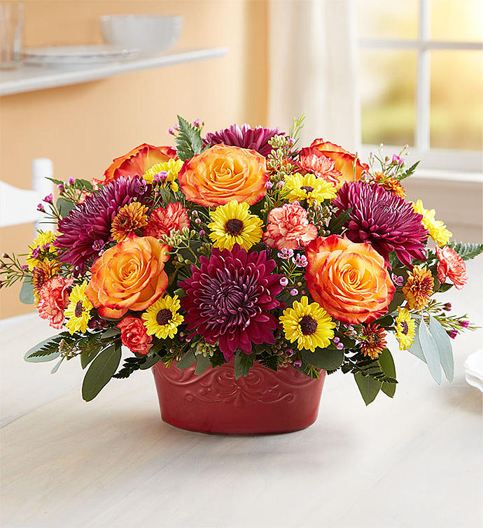 Autumn Gathering Casserole Dish Centerpiece - We’ve cooked up a wonderful, all-in-one gift for all their autumn gatherings. Created exclusively through our collaboration with Pfaltzgraff™, this unique gift combines a vibrant arrangement with a versatile entertaining piece. They’ll love admiring the fall-toned blooms, then using the crimson-colored casserole dish over and over, which lets them simply cook, serve, save and enjoy! It’s an everything-safe bakeware essential that can be used for years to come.