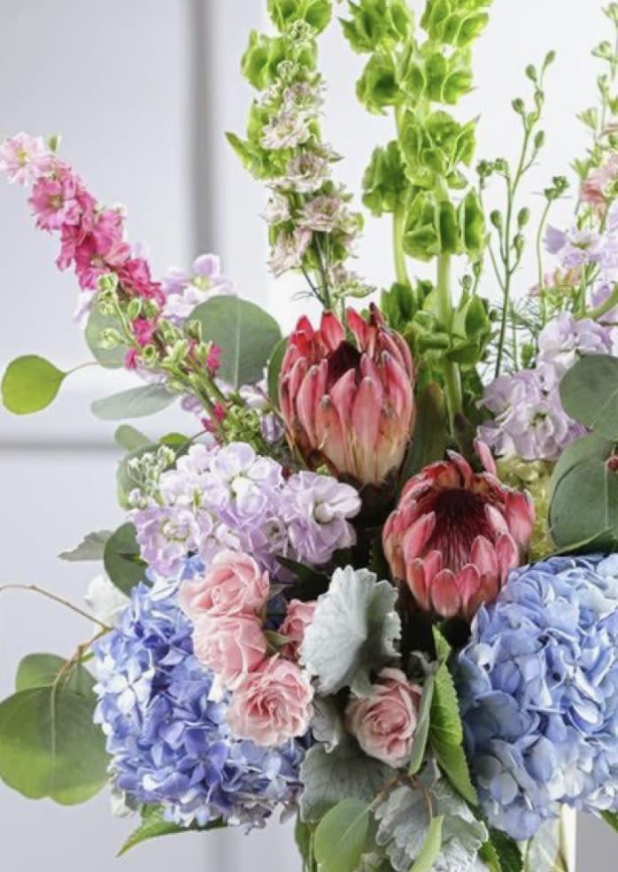 Show Your Sorority Colors - Show sorority pride with a beautiful arrangement in her new sorority colors! This is a mixed cut arrangement in her new sorority colors. Flowers and colors will vary according to price point and sorority house colors as each arrangement will be unique.
