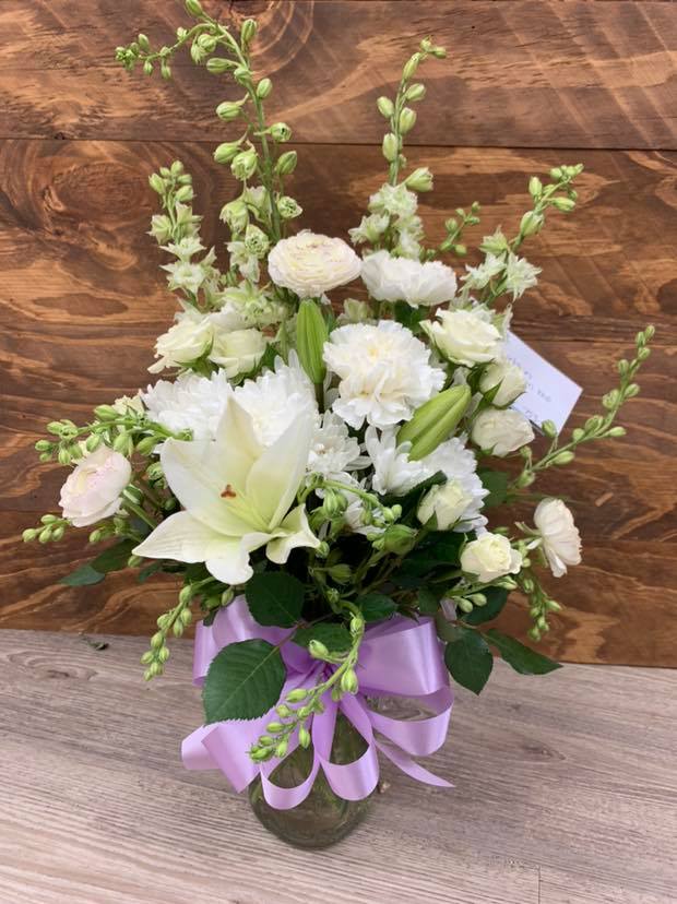 Remember Me - Always remember the special memories made with someone special with this wondrous all white arrangement.