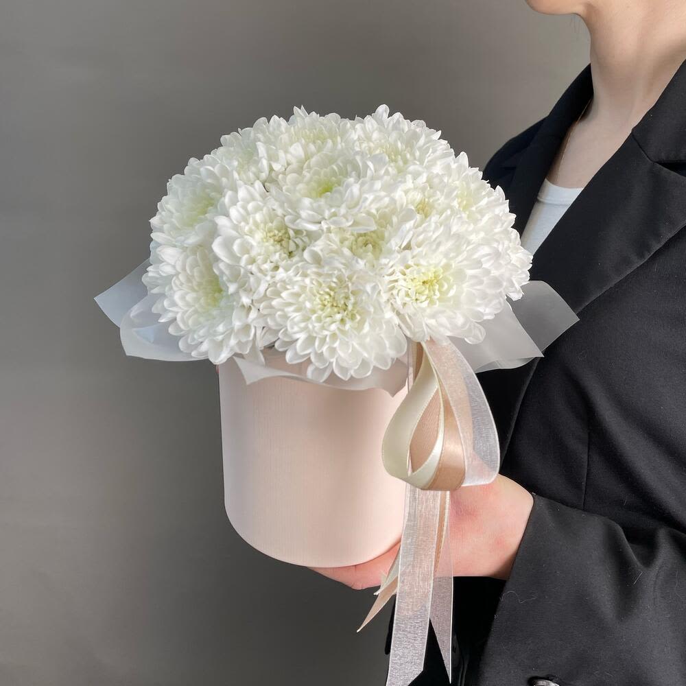 Hat Box With Chrysanthemum - Due to current supply shortages, some substitutions of flowers and containers (hat box/vase) may be required. We will ensure that the overall look and feel of the gift you selected is preserved. All upgrade arrangements come without a vase - if you wish to purchase one please call us at (347) 492-5777. Thank you for your understanding and support.