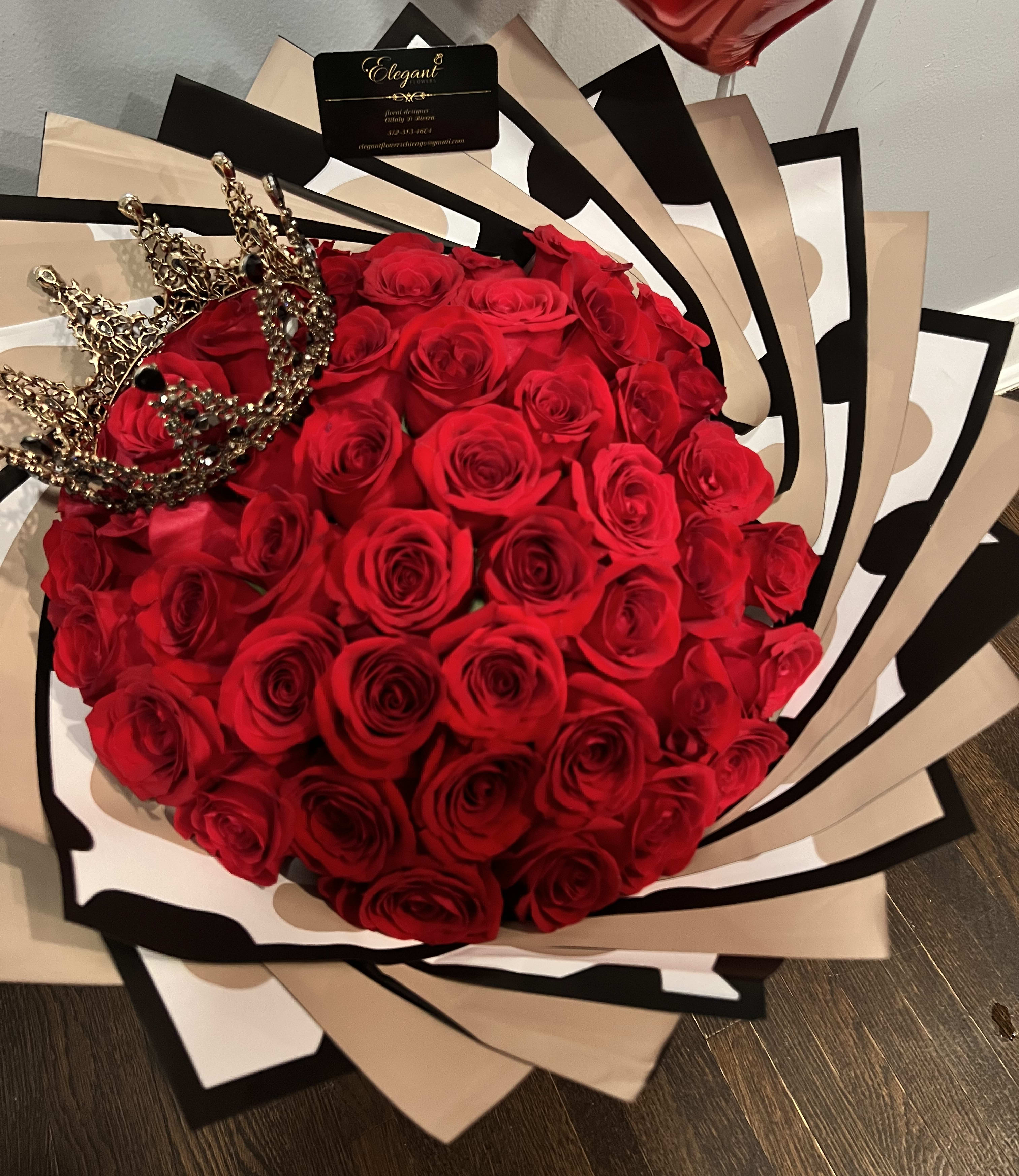 Passion Love - Passion Love is a stunning arrangement of 50 long-stem red roses (60–70cm) with a barroca crown on top. Each rose is carefully arranged with spiral wrapping pattern, accented with elegant black stripes. A perfect gift for expressing love and affection.