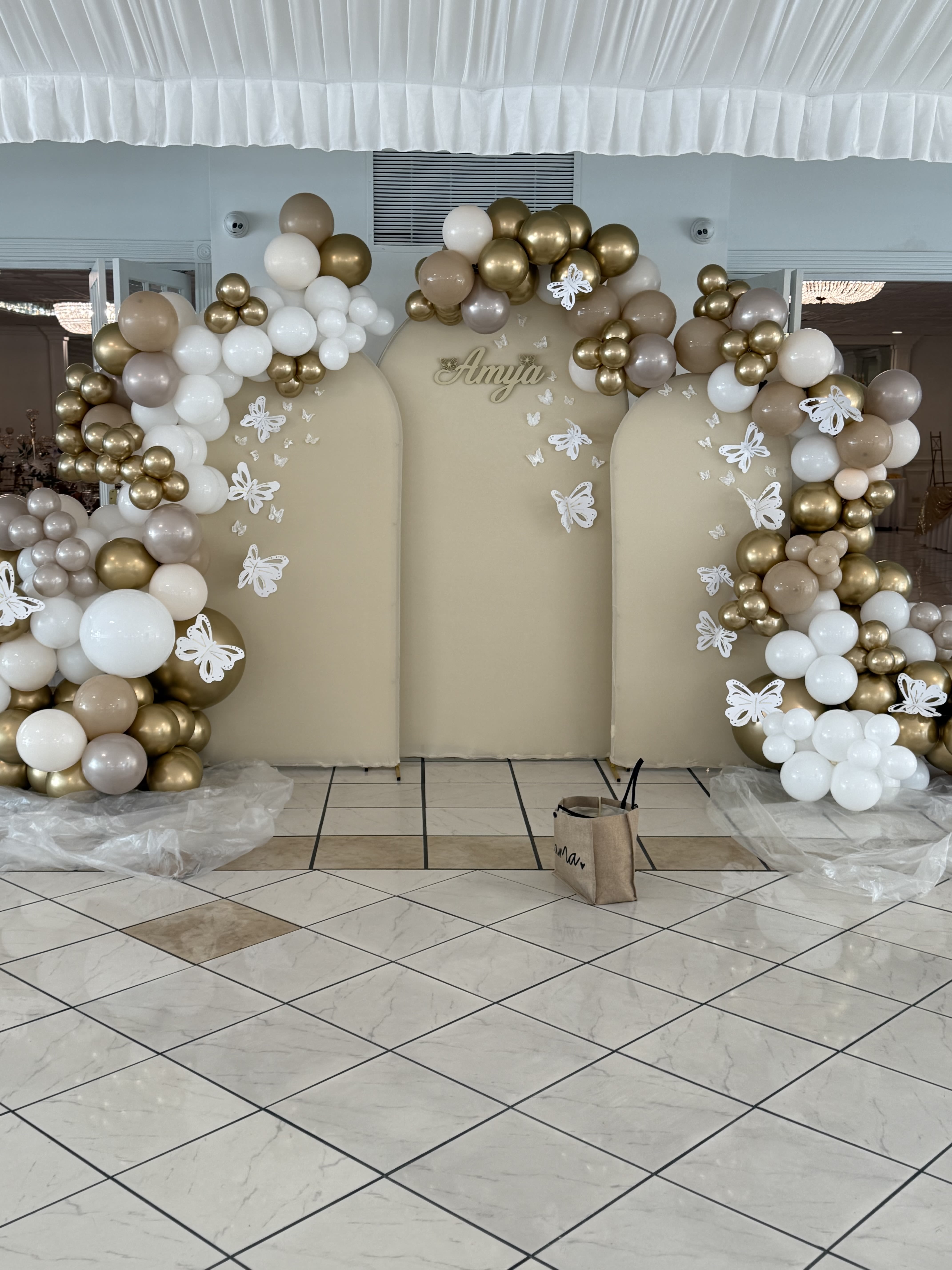 3 ARCH &amp; Double Balloon Garlands on Each Side    - Get this look - includes white butterflies and name in vinyl.  Your choice of arch colors and up to 5 colors for the balloon garlands.  The look pictured has white, gold, pale salmon, hazelnut and creamy beige. The balloon garlands are double on both sides and on top.   