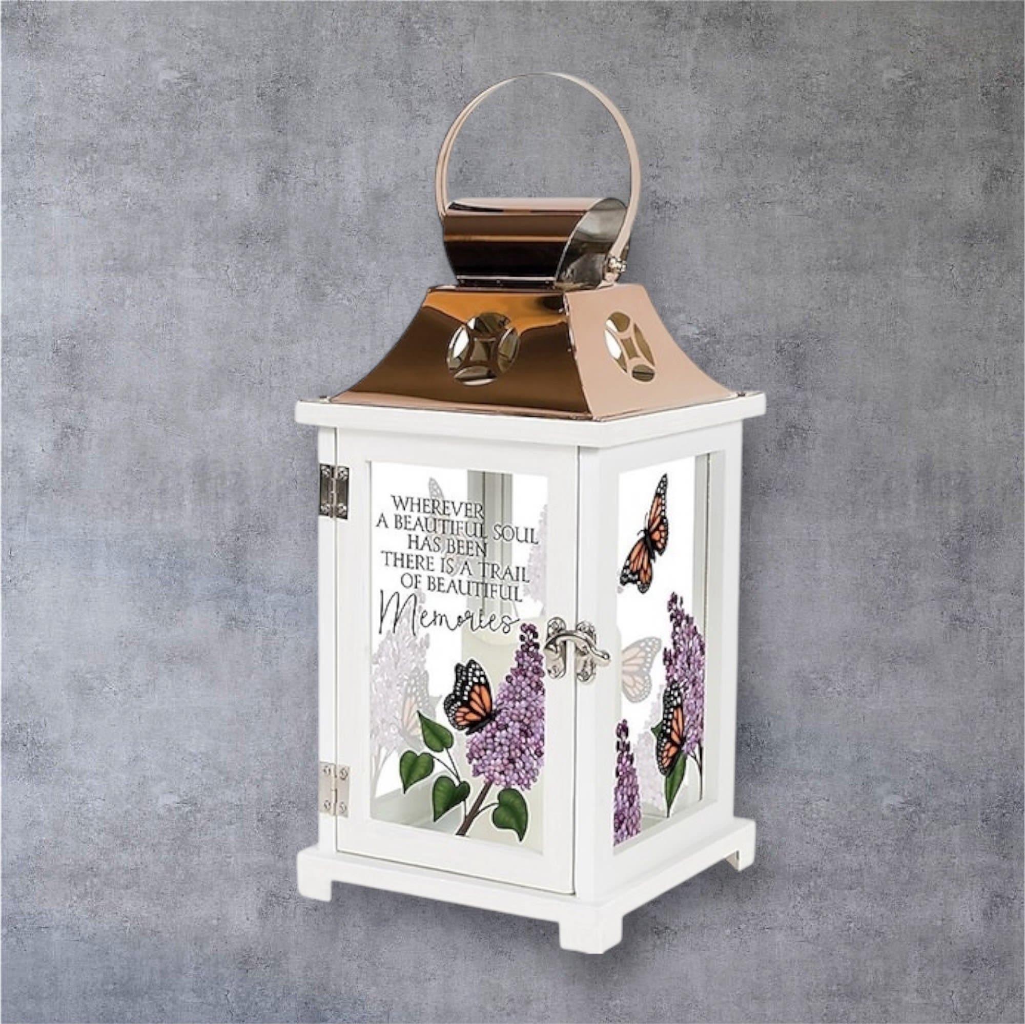 Memorial Lantern  - Butterfly  - Beautiful memorial lantern with hand painted look of butterflies.. as well as the sentiment &quot;Wherever a beautiful soul has been.. there is a trail of beautiful memories.&quot; Made of wood, glass and reflective coppered metal. &quot;13.5x6.25 This lantern includes a flickering battery operated candle. It will be hand delivered turned on and with your sentiment on a printed card.