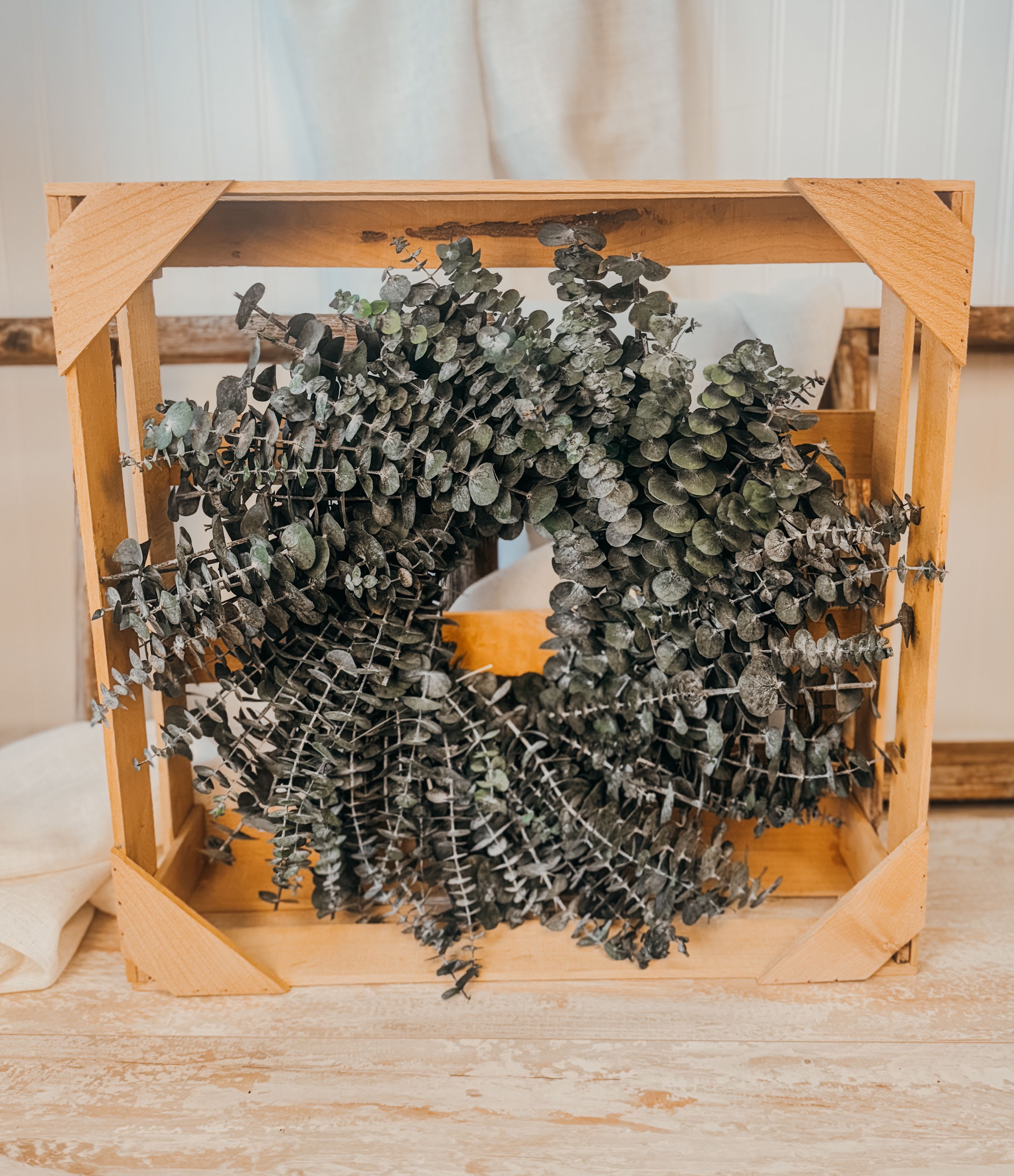 Eucalyptus Wreath - - 18&quot; diameter - Dried material   - Please note that our wreaths are handmade of natural materials that can be damaged if exposed to rain, snow, or heavy wind. We recommend keeping our wreaths inside or on a covered porch to protect the wreath.